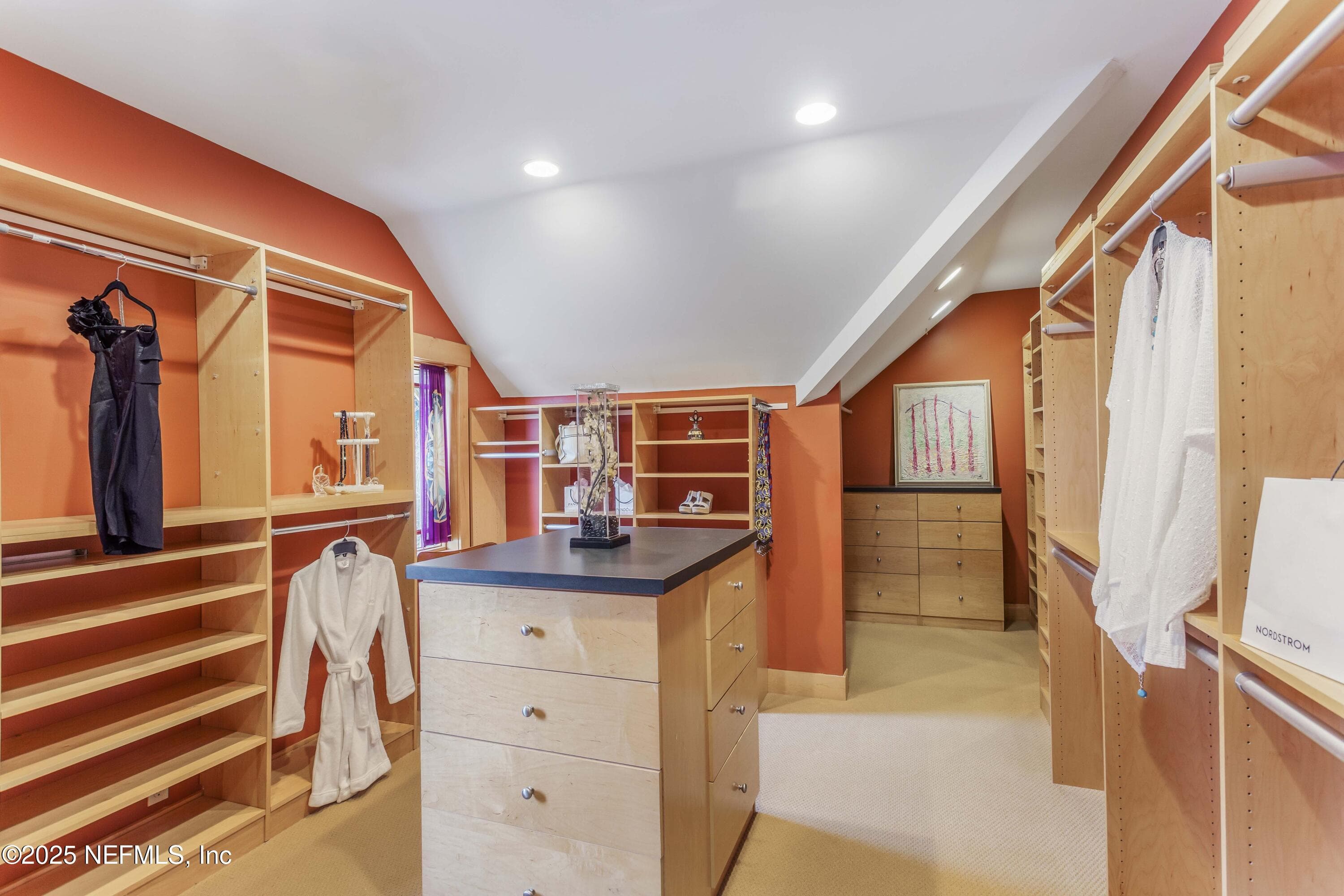 Walk-in closet with shelving and built-in dresser. — 940564 OLD NASSAUVILLE Road, Fernandina Beach, FL 32034