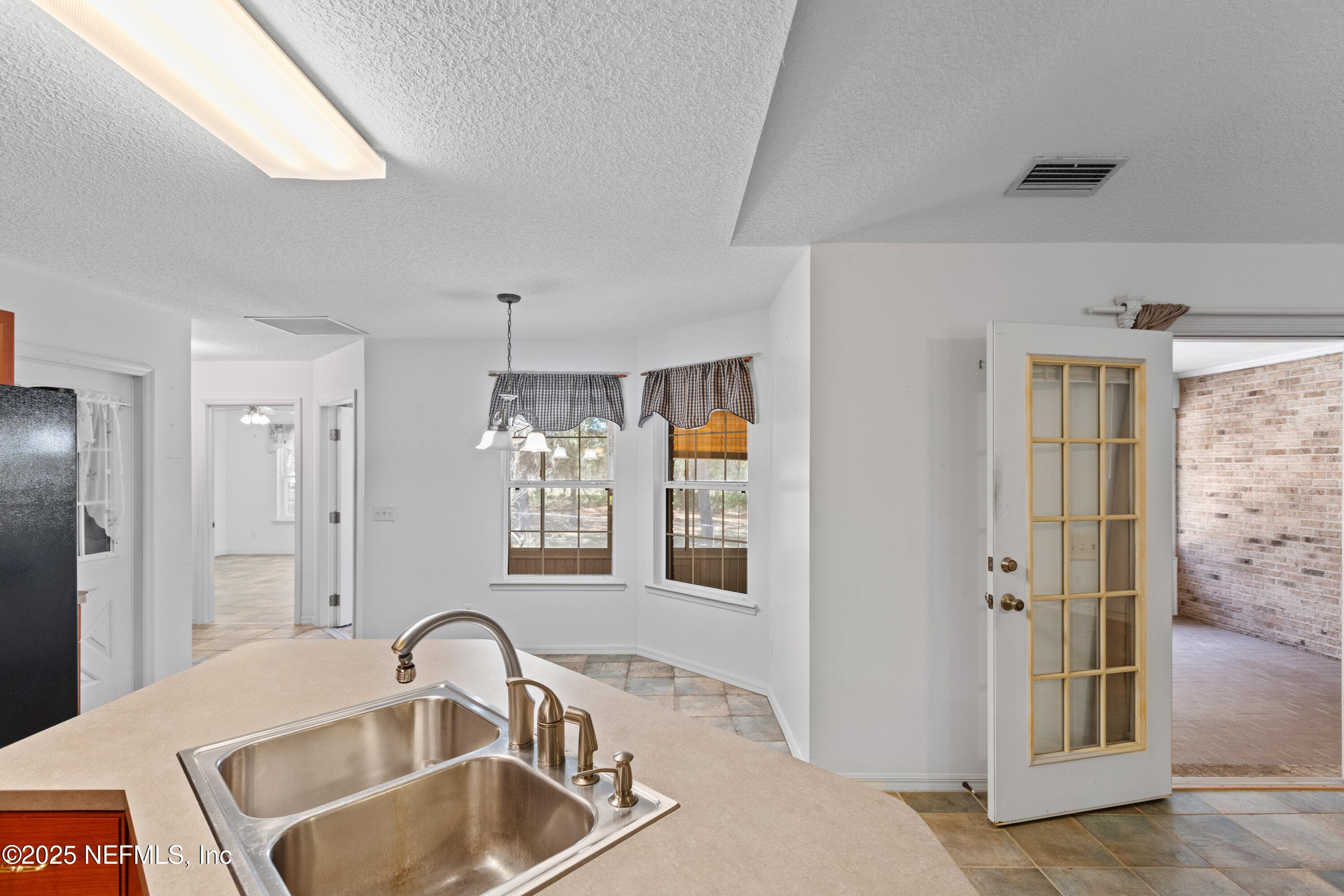 Screen porch off kitchen — 163 BOOTS Road, Melrose, FL 32666
