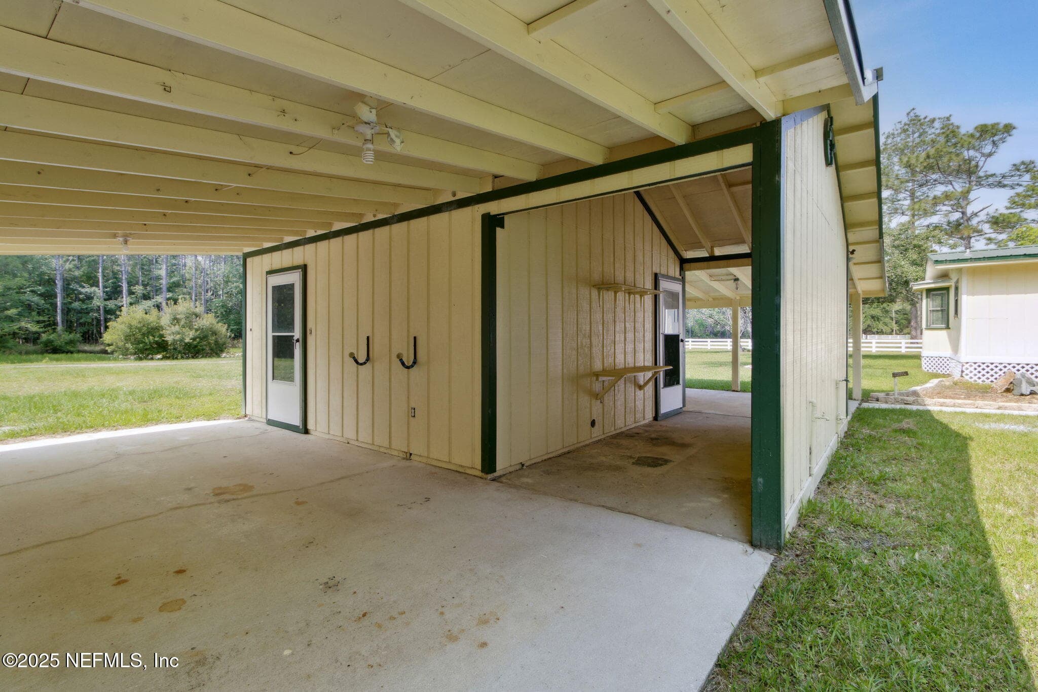 car port with utility room — 2889 SANTA FE Trail, Hilliard, FL 32046