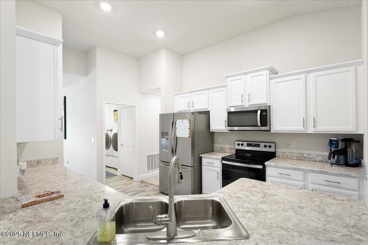 Photo 11 of 79 REIDSVILLE Drive, Palm Coast, FL 32164