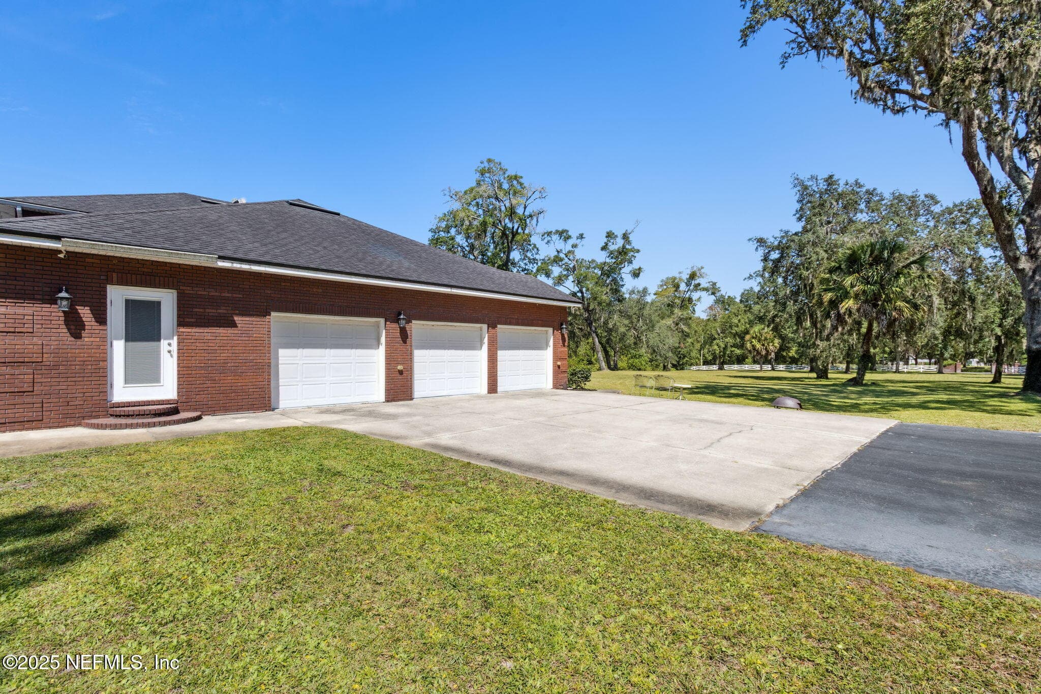 3 car garage — 87377 RADDIN Road, Yulee, FL 32097