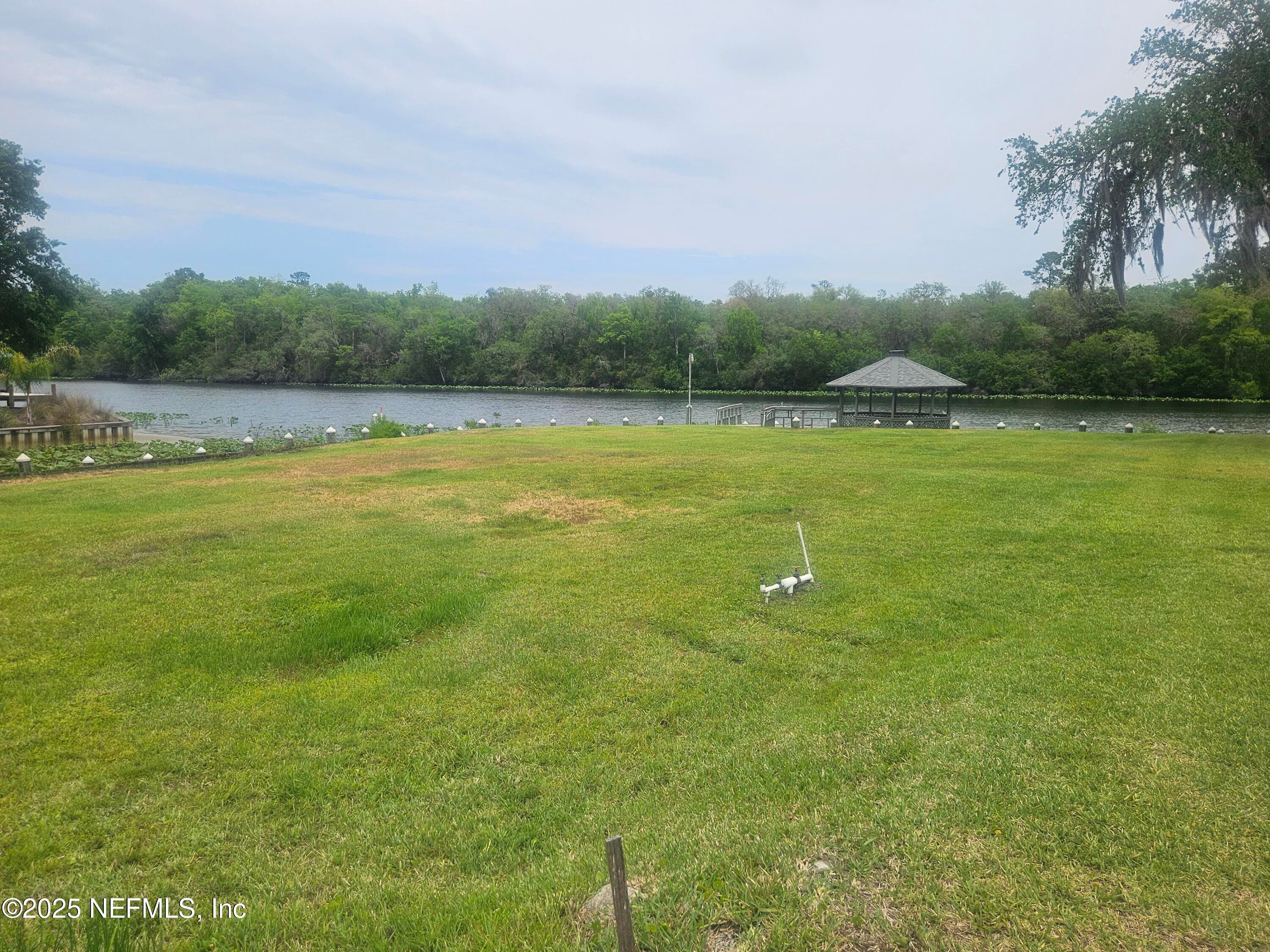 Backyard with Bulkhead along Black Creek — 435 LAKE ASBURY Drive, Green Cove Springs, FL 32043