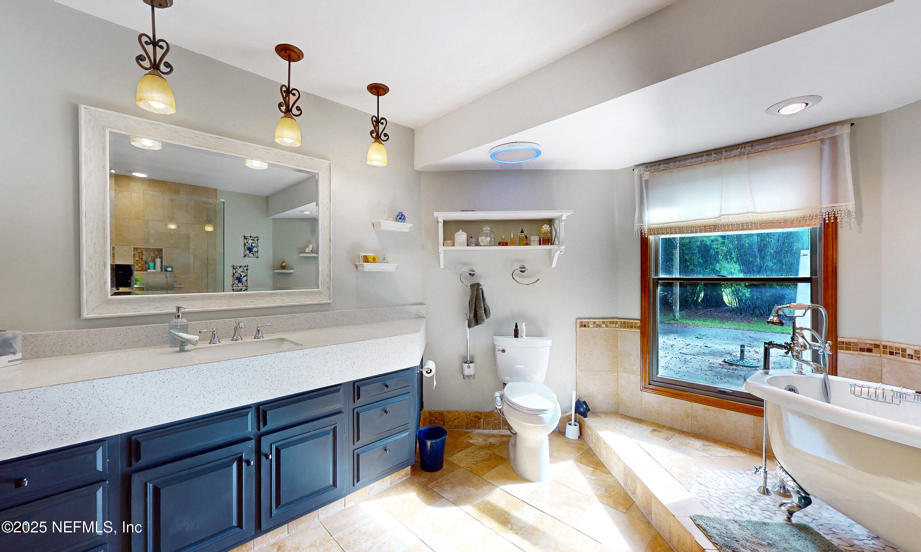 Owner's bath with double vanity and claw foot tub — 2860 RAVINES Road, Middleburg, FL 32068