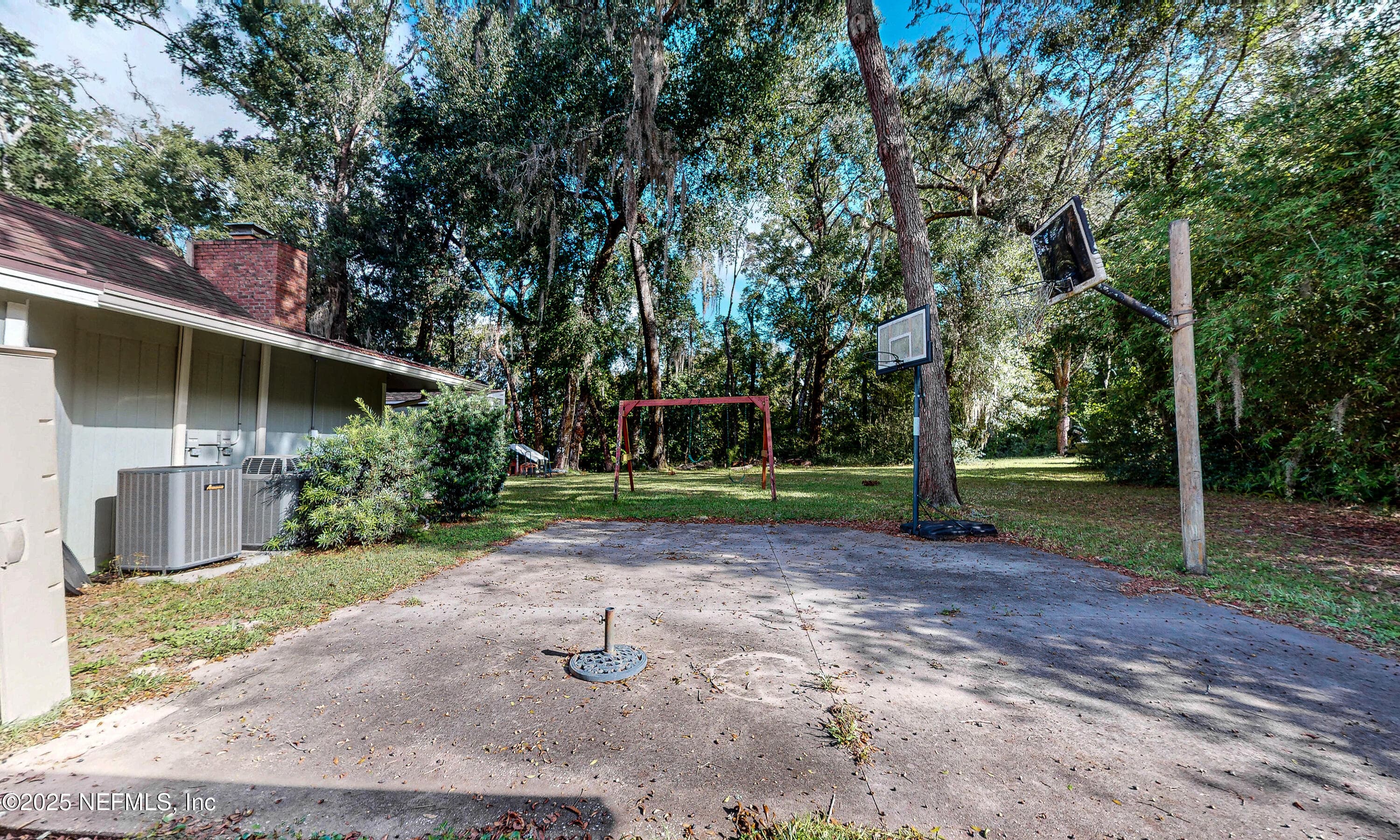 Flex patio/ basketball court — 2860 RAVINES Road, Middleburg, FL 32068