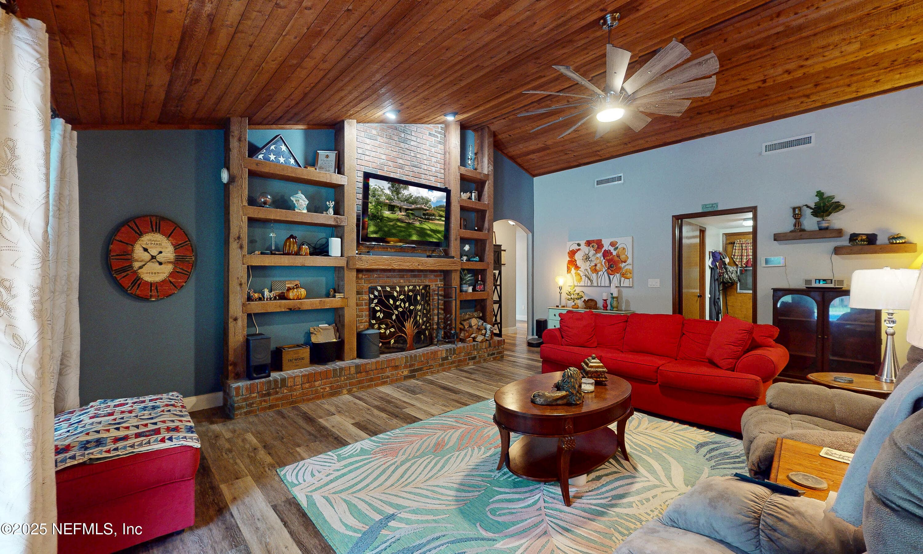 Family room with fireplace #2 and custom built-ins — 2860 RAVINES Road, Middleburg, FL 32068