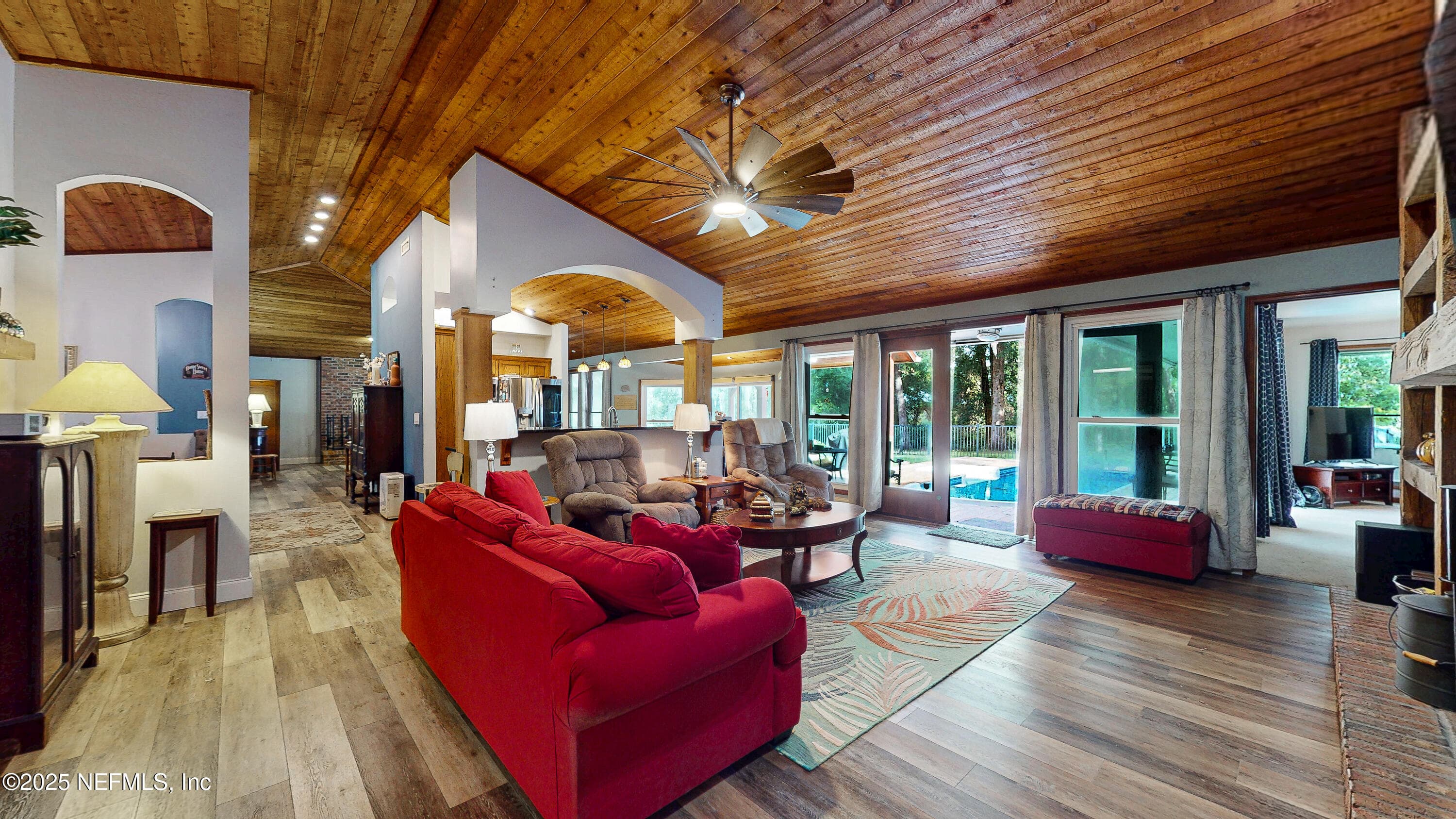 Open floorplan from family room to kitchen — 2860 RAVINES Road, Middleburg, FL 32068