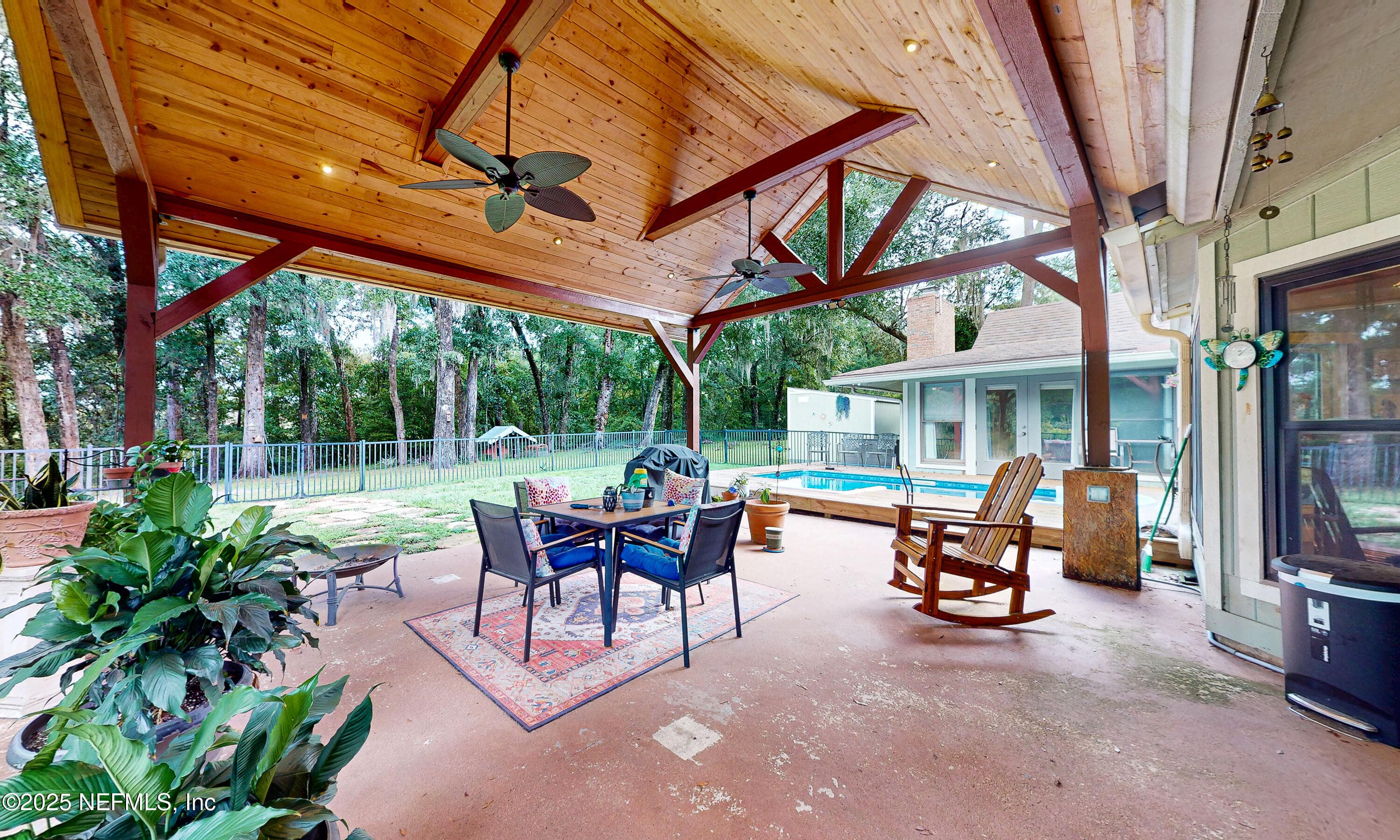 Covered patio overlooking the pool. — 2860 RAVINES Road, Middleburg, FL 32068