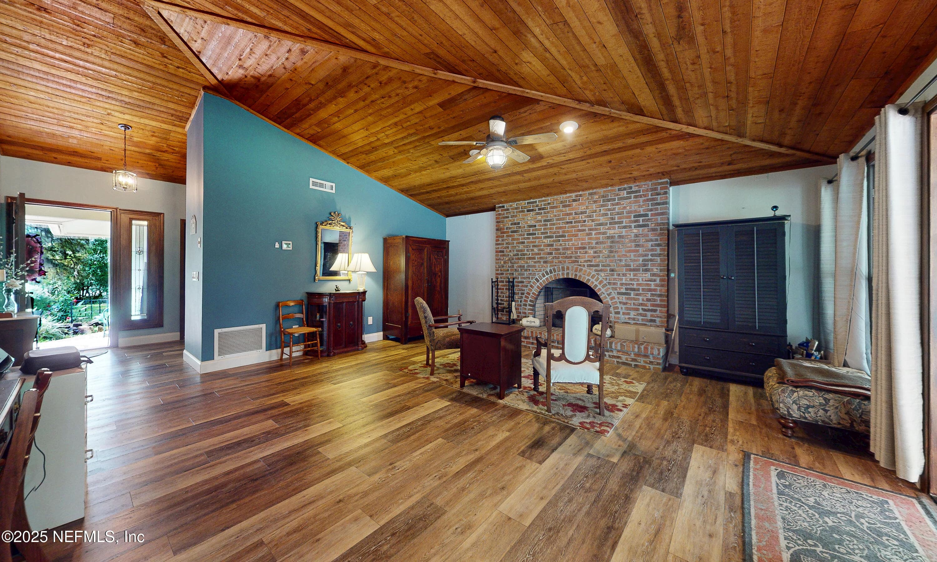 Living room with fireplace #1 — 2860 RAVINES Road, Middleburg, FL 32068