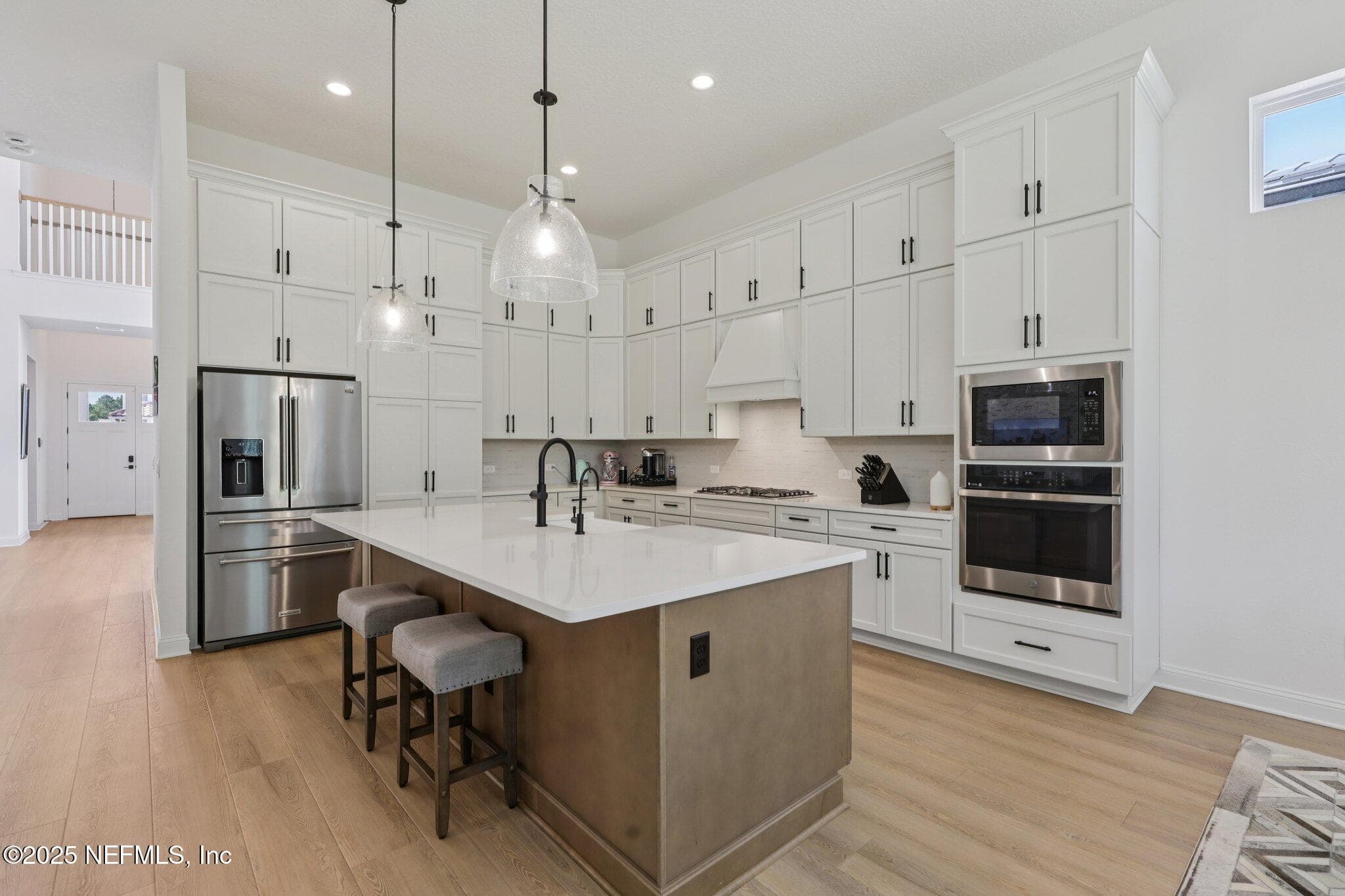 Double stack white cabinets - amble storage! — 3089 SPIRO Circle, Jacksonville, FL 32246
