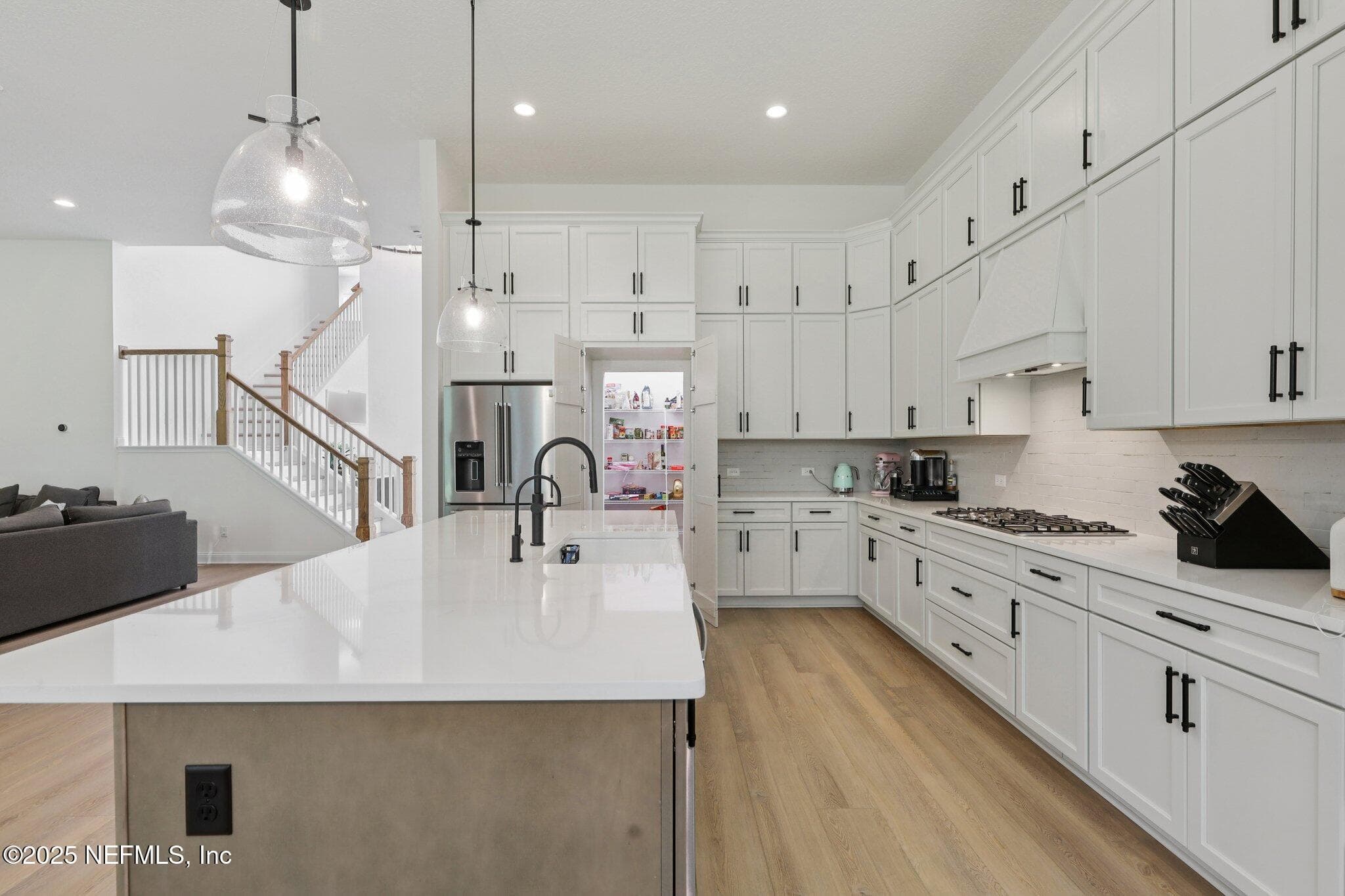 Did you notice the hidden pantry? What a great way to keep organize! — 3089 SPIRO Circle, Jacksonville, FL 32246