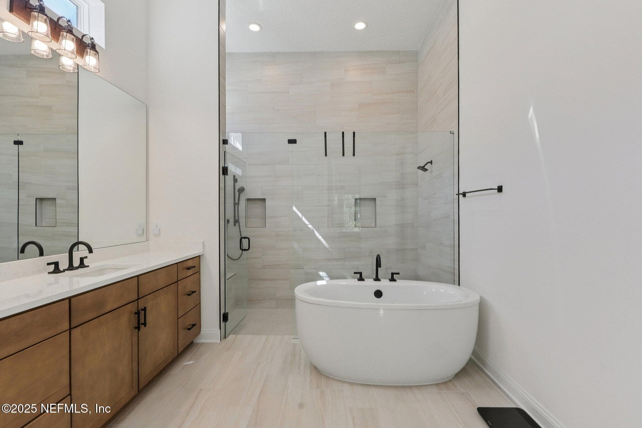 Primary Bathroom; Stand alone soaking tub and large walk-in shower. — 3089 SPIRO Circle, Jacksonville, FL 32246