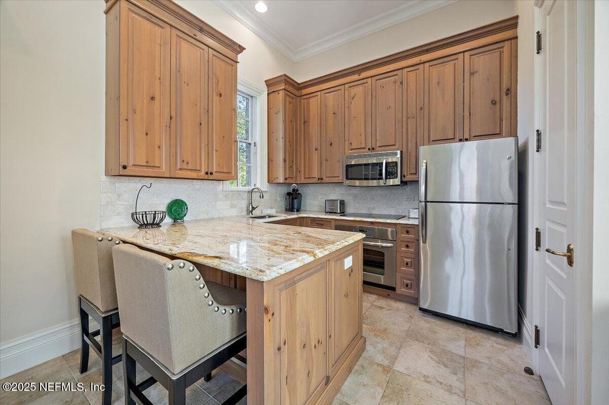 Featuring an oven, microwave, full sized dishwasher & sink! — 5367 CHANDLER BEND Drive, Jacksonville, FL 32224