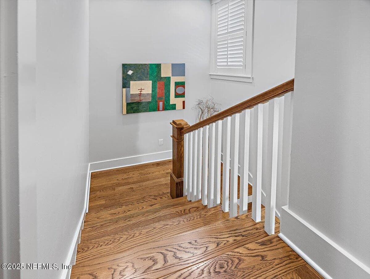 These stairs lead to the carport, amazing backyard & almost 800 sq. feet of heated & cooled basement/storage — 2743 GREEN BAY Lane, Jacksonville, FL 32207