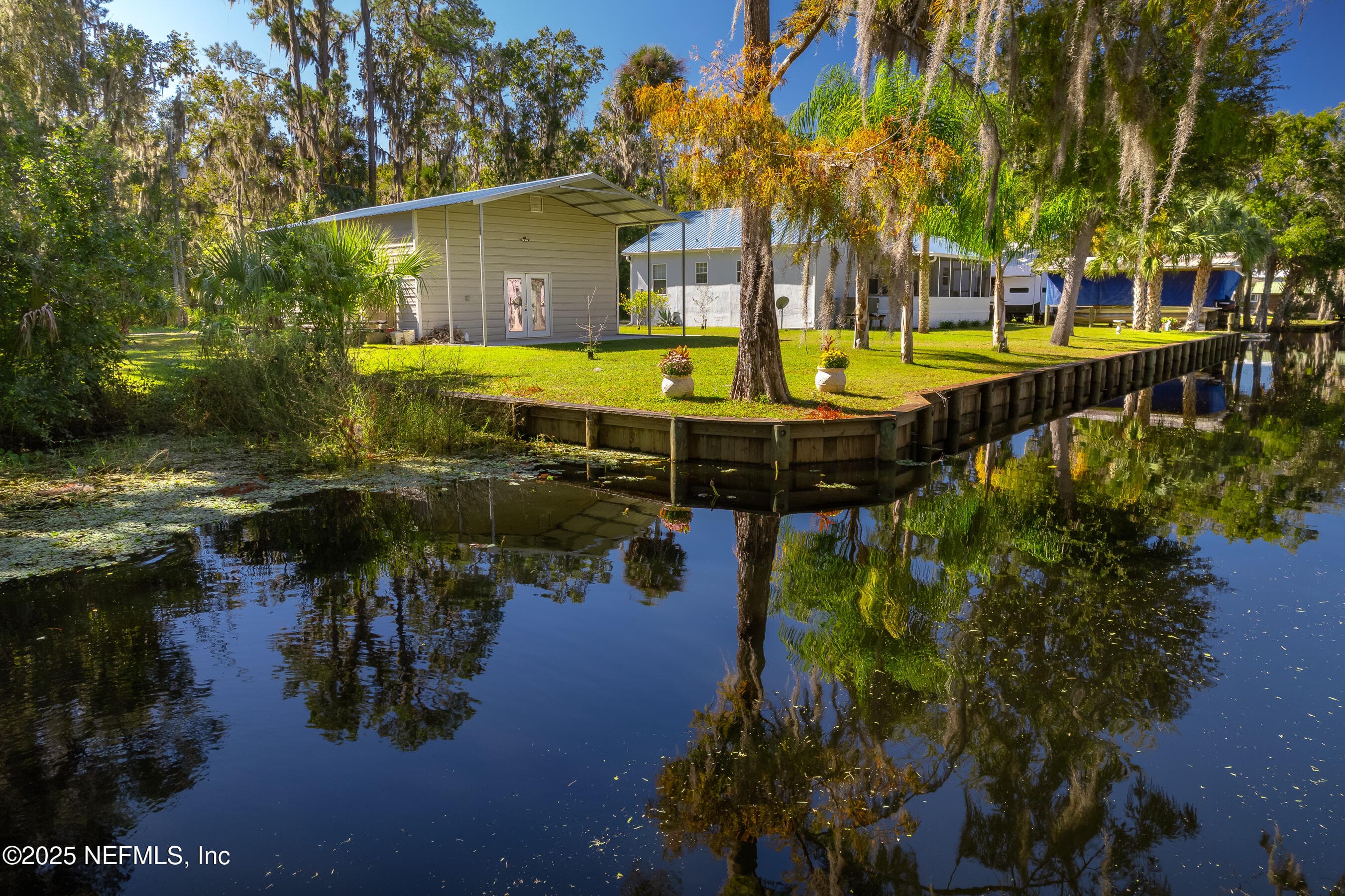 View from oposing property on canal — 118 HICKS Avenue, Crescent City, FL 32112
