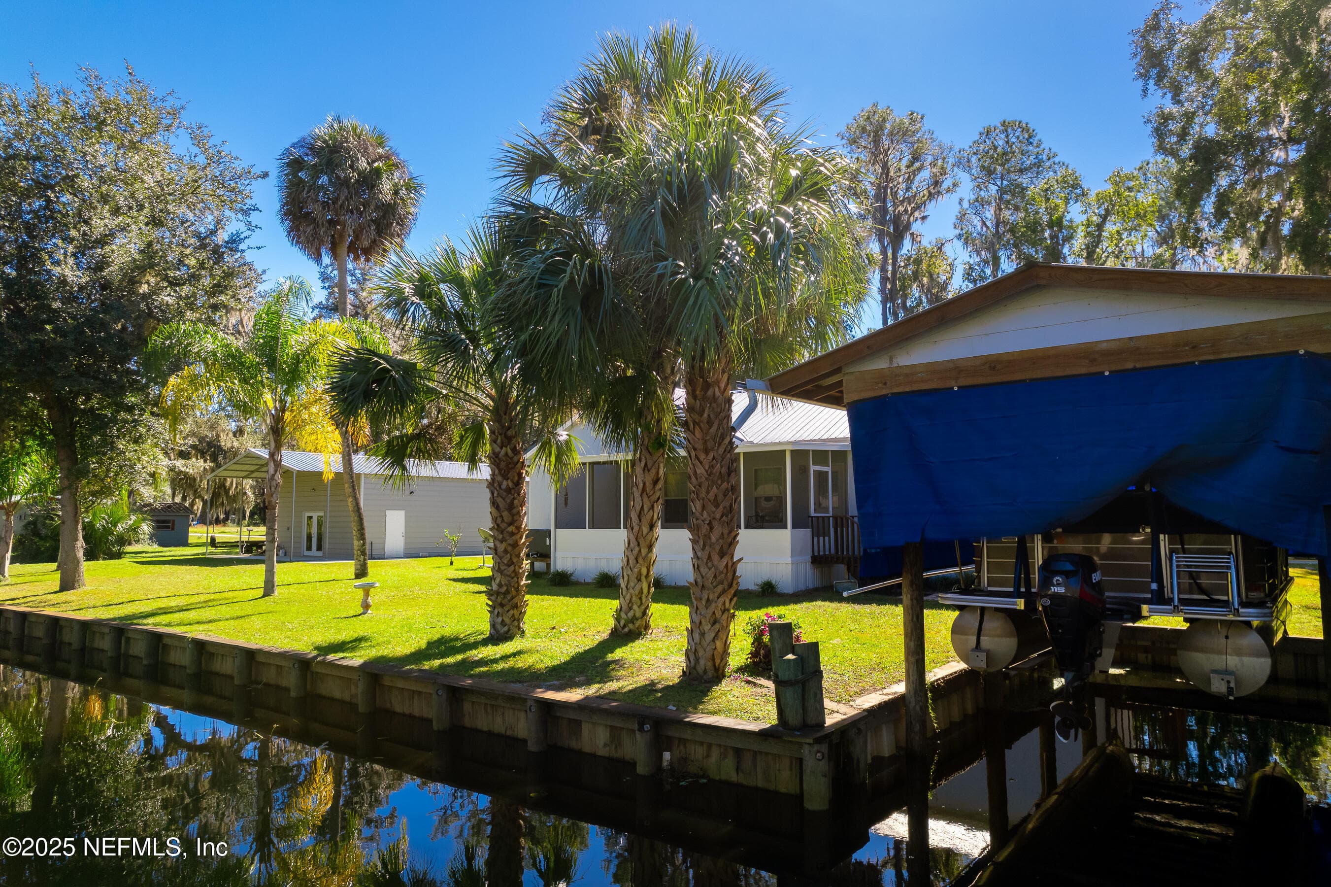 Canal view, property seen on right — 118 HICKS Avenue, Crescent City, FL 32112