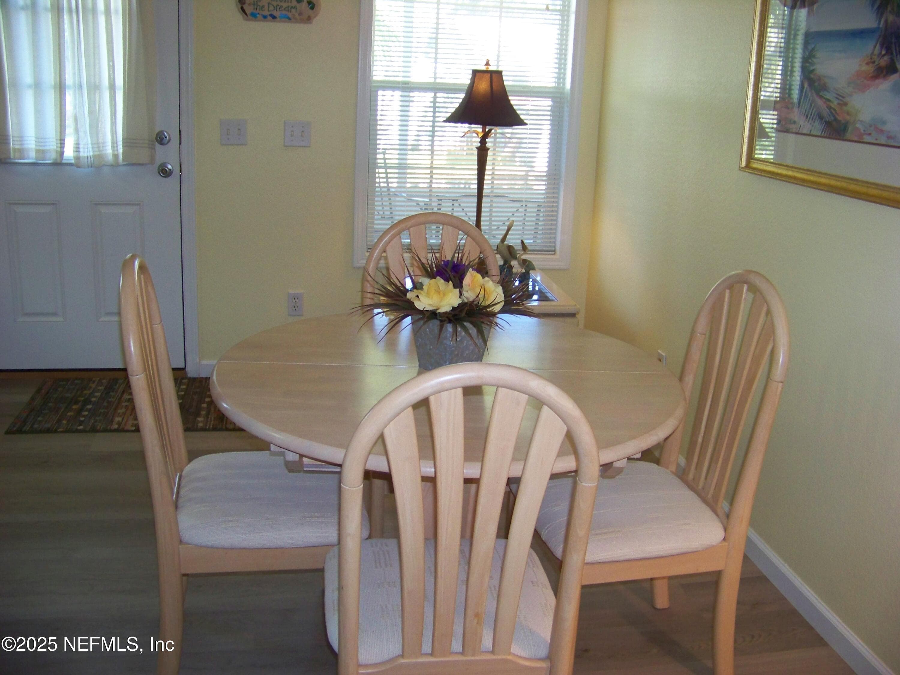 Dining room has access to screened porch & backyard — 118 HICKS Avenue, Crescent City, FL 32112