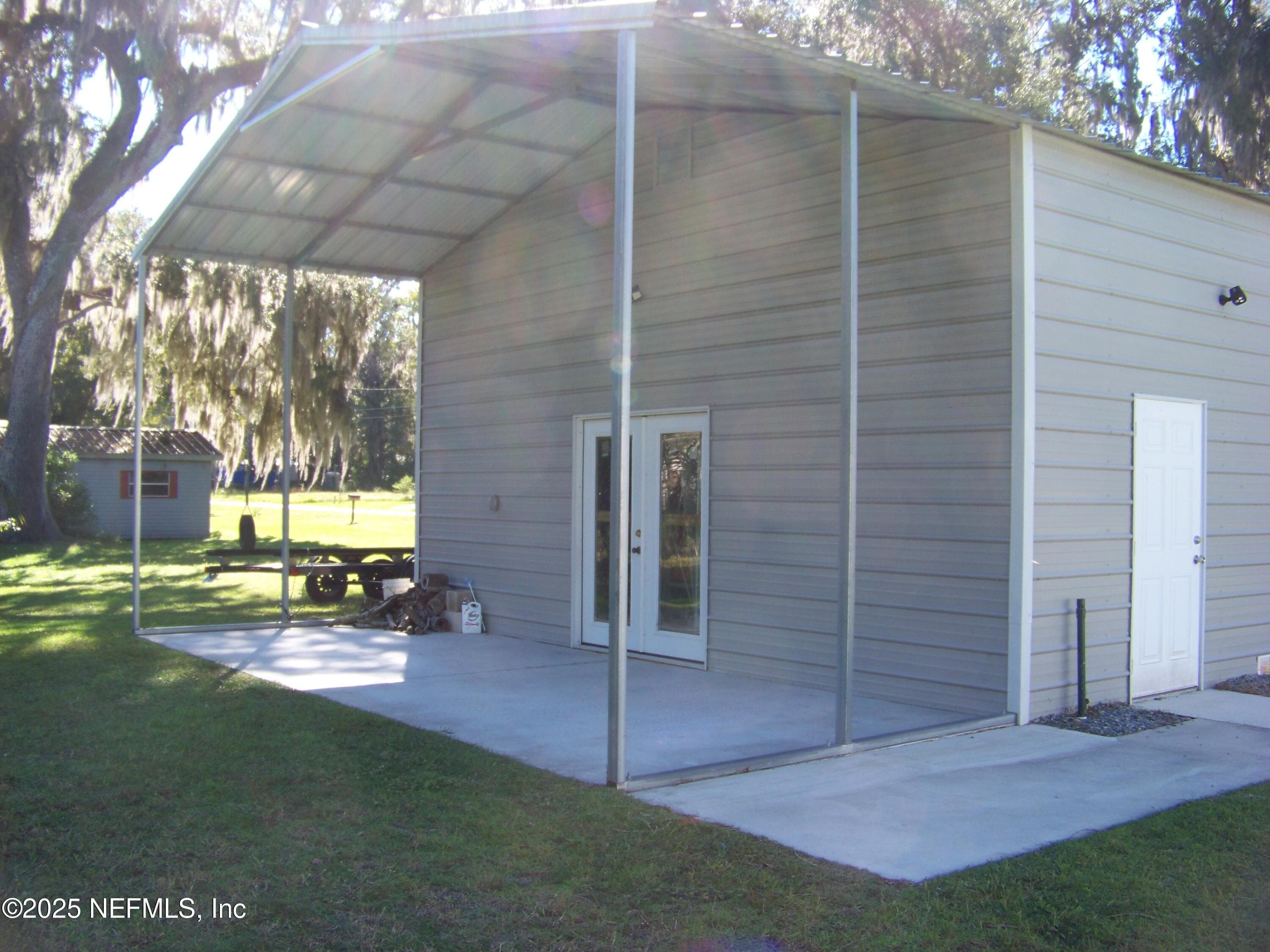 Concrete walkways and concrete driveway — 118 HICKS Avenue, Crescent City, FL 32112