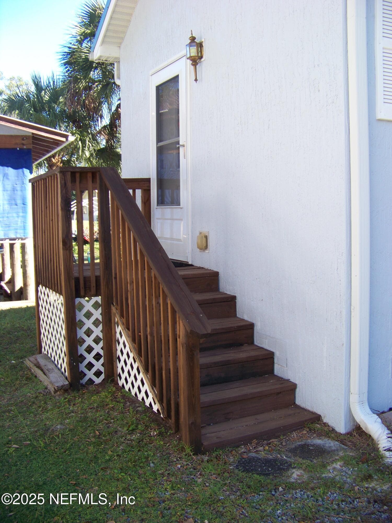 Side entry to the home — 118 HICKS Avenue, Crescent City, FL 32112