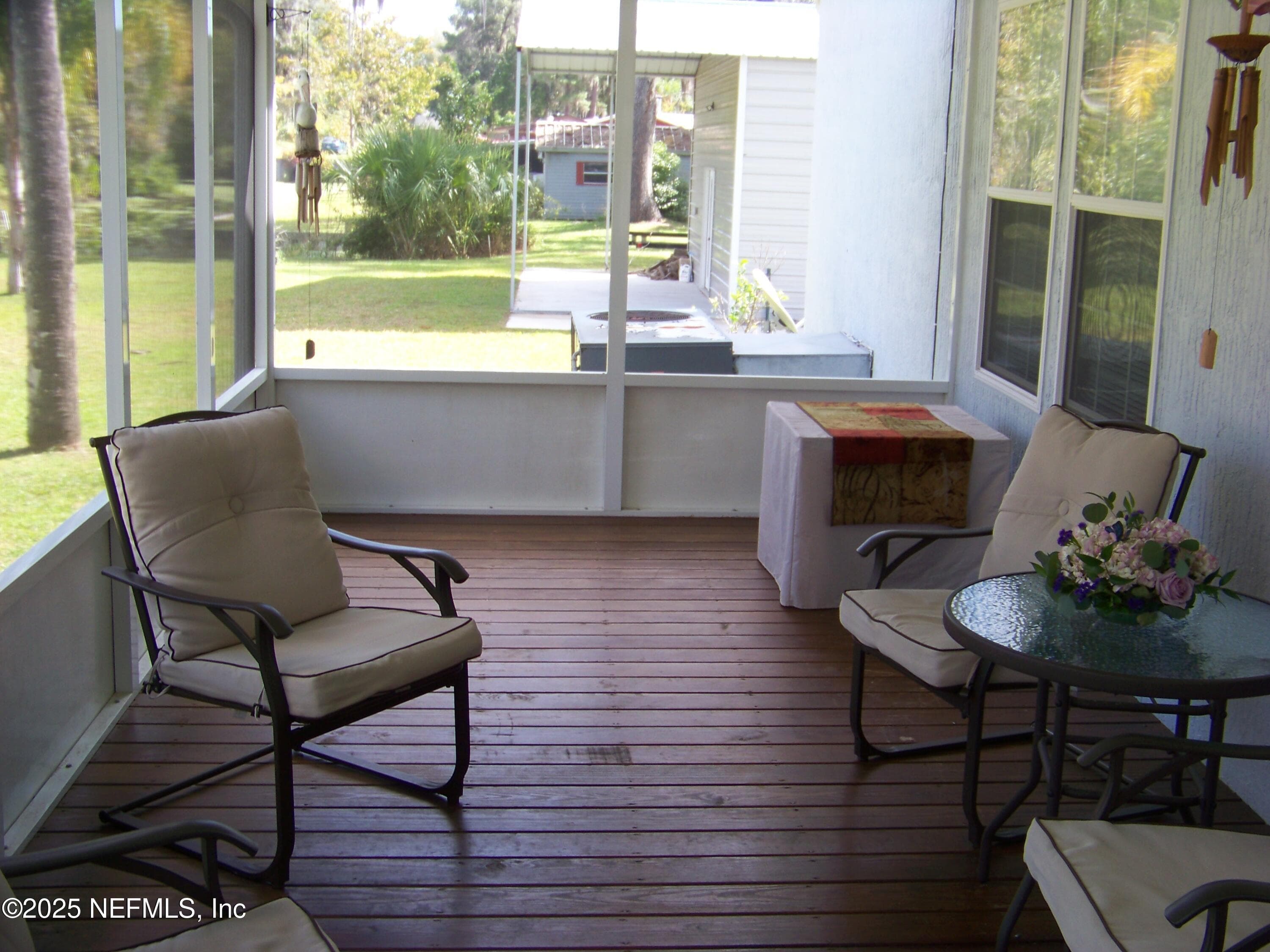 Spacious screened porch — 118 HICKS Avenue, Crescent City, FL 32112