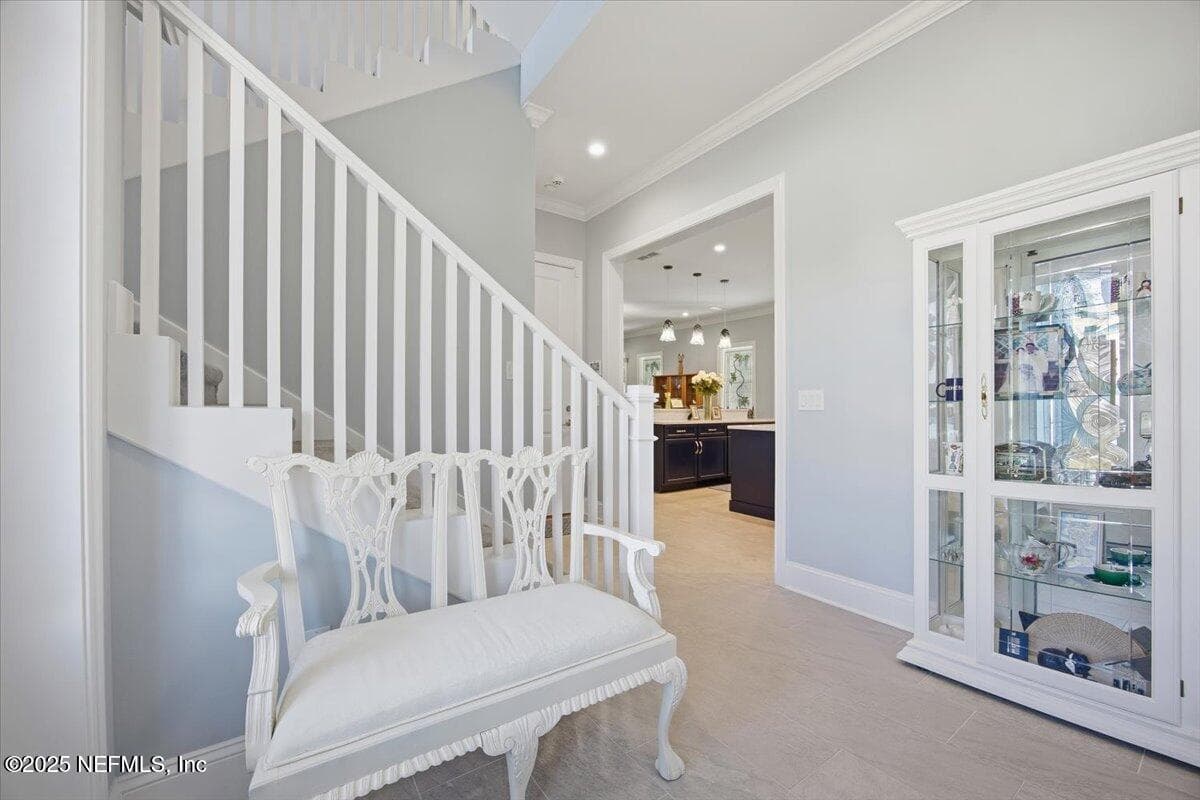 Step on in... it's so beautiful. Seaglass light fixture in the entry. — 4 SUMMER Court, Jacksonville Beach, FL 32250