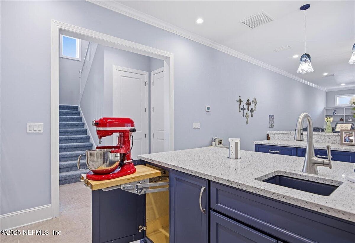 A LIFT for the mixer is so convienent. And, look at that pop up outlet that has charger stations in it also. NICE! — 4 SUMMER Court, Jacksonville Beach, FL 32250