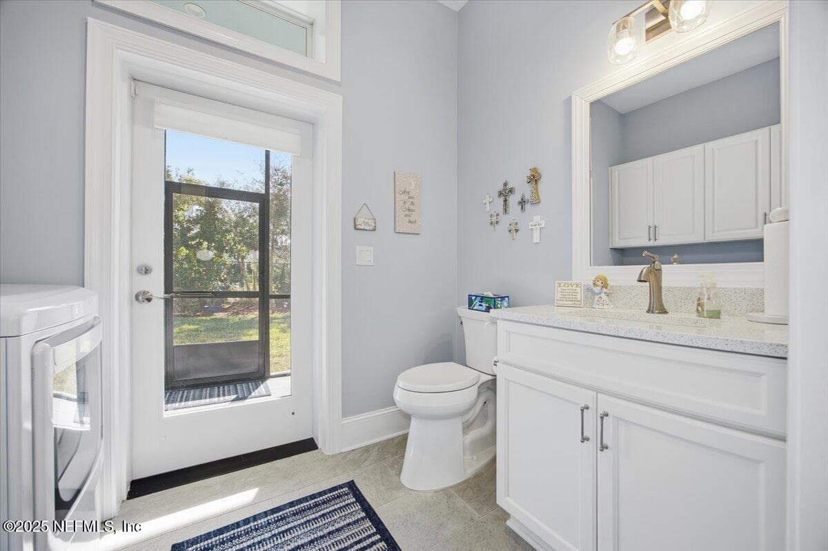Laundry and half bath. Dryer plumbed for electric and gas — 4 SUMMER Court, Jacksonville Beach, FL 32250