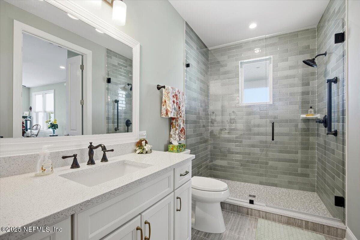 And, speaking of loving green, check out this amazing bathroom off the man cave. Also has grab bar in the shower. — 4 SUMMER Court, Jacksonville Beach, FL 32250