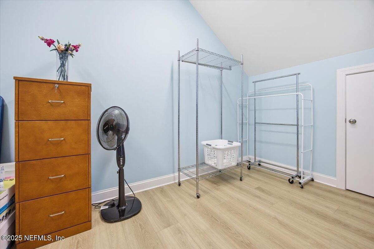 Tjhis jumbo closet is almost a room it inself. It houses another closet for storage, and the HVAC for 3rd floor, but PLENTY of room to use for storing your things. — 4 SUMMER Court, Jacksonville Beach, FL 32250