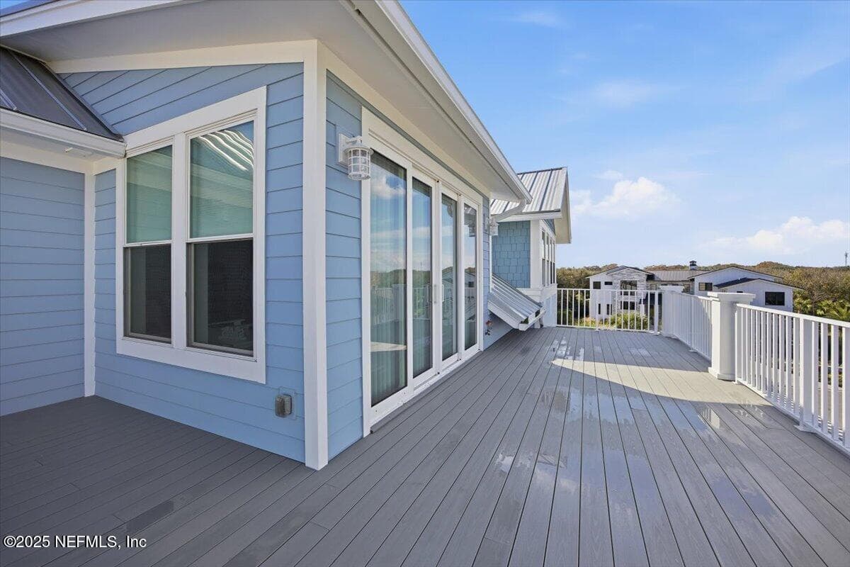 Big balcony that wraps around to east side of house. The view is amazing (great place to watch the Blue Angels.) — 4 SUMMER Court, Jacksonville Beach, FL 32250