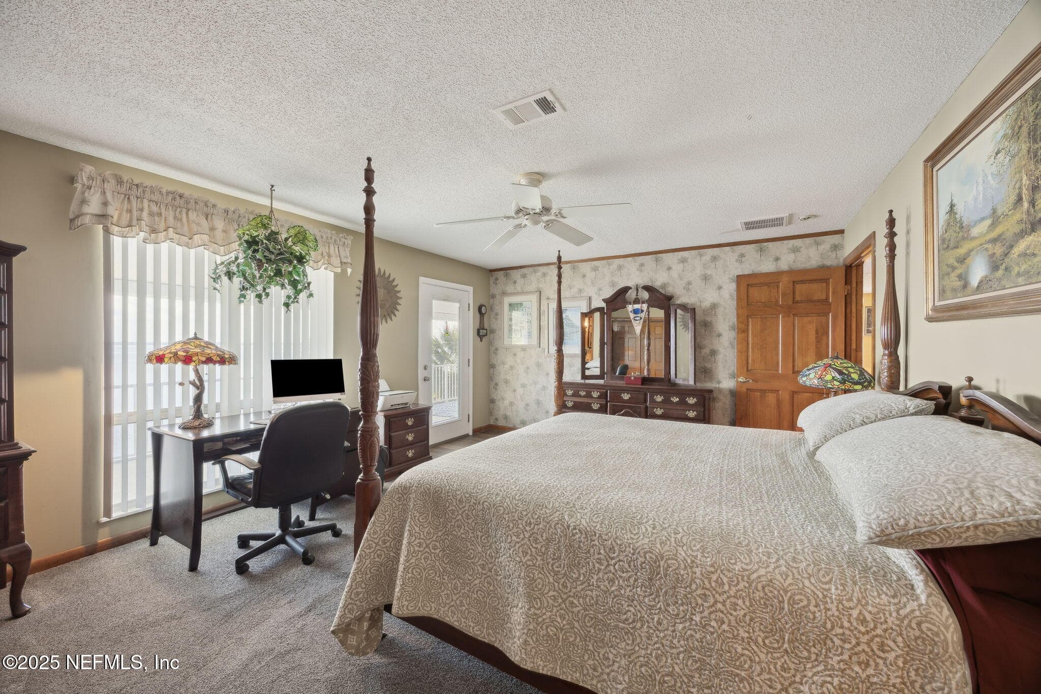 Upper-level master bedroom with a view of Lake Crescent — 259 S PROSPECT Street, Crescent City, FL 32112