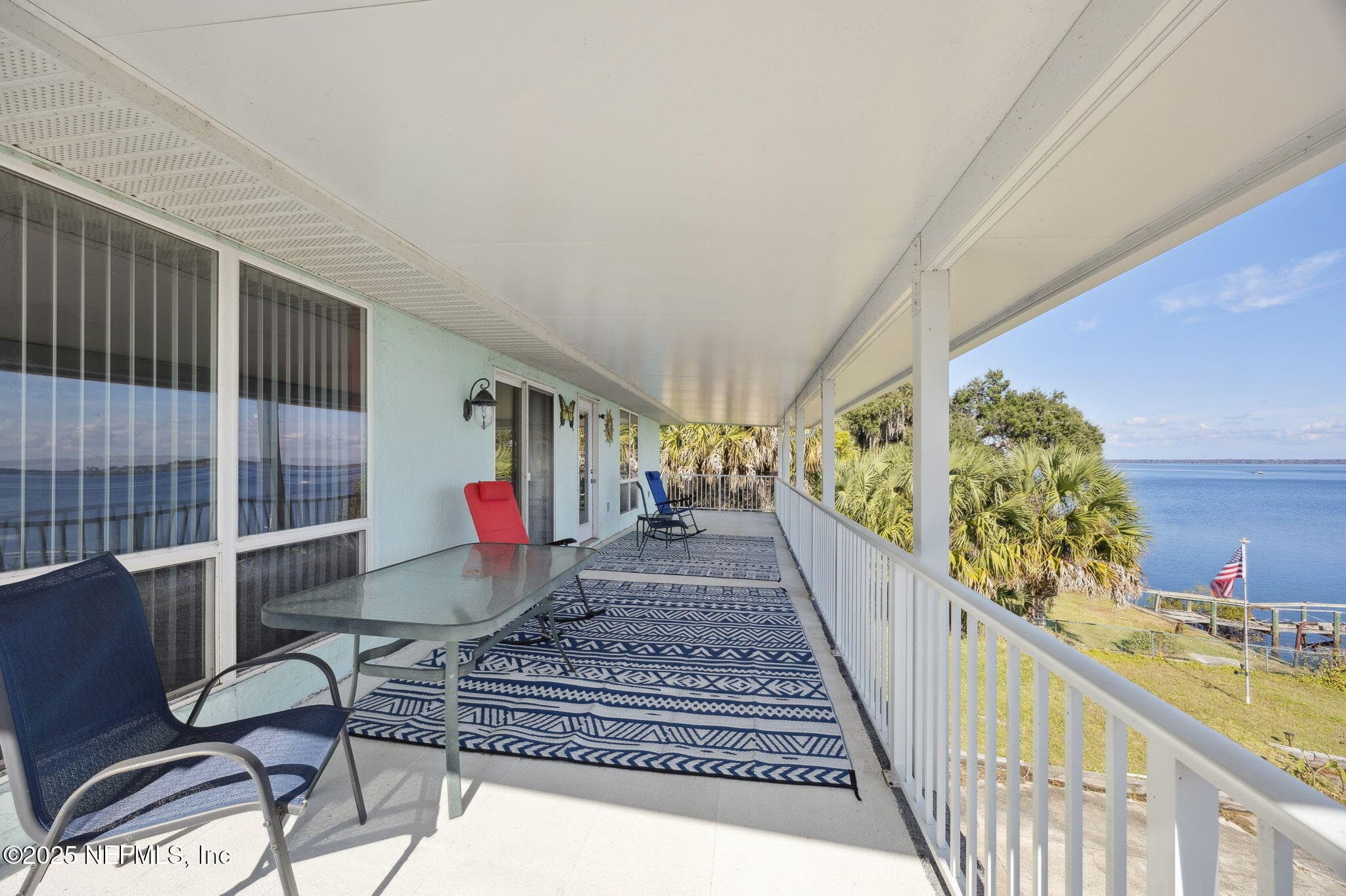 Upper-level balcony, a place to sit, read and book and enjoy the view — 259 S PROSPECT Street, Crescent City, FL 32112