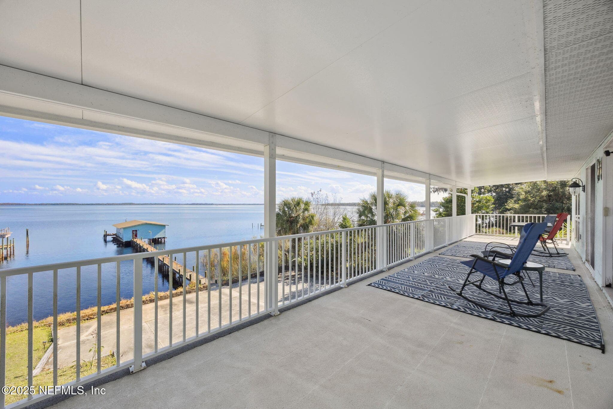 Upper-level balcony view of your private dock and boat house — 259 S PROSPECT Street, Crescent City, FL 32112