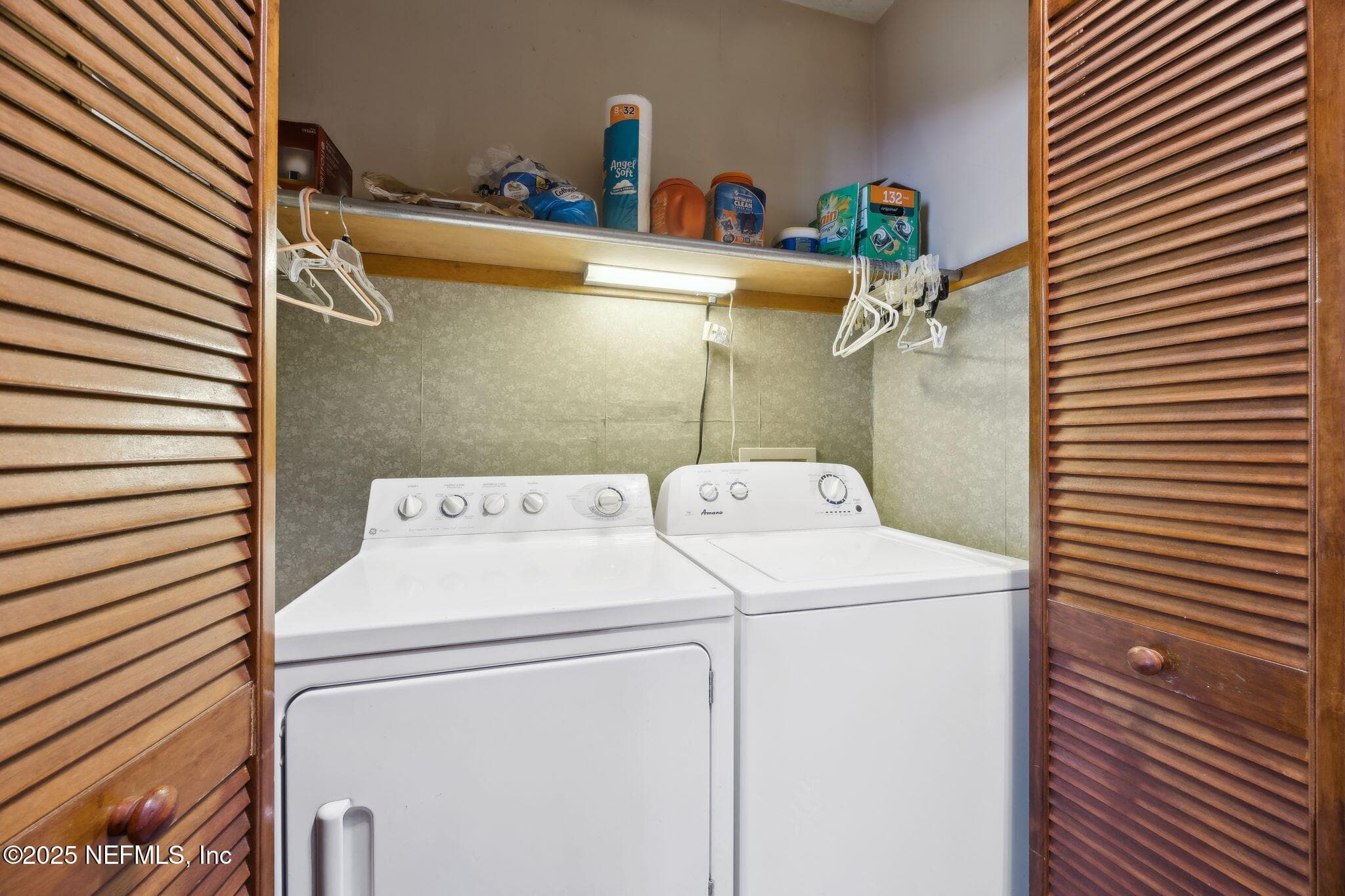 Laundry area in lower-level bathroom — 259 S PROSPECT Street, Crescent City, FL 32112