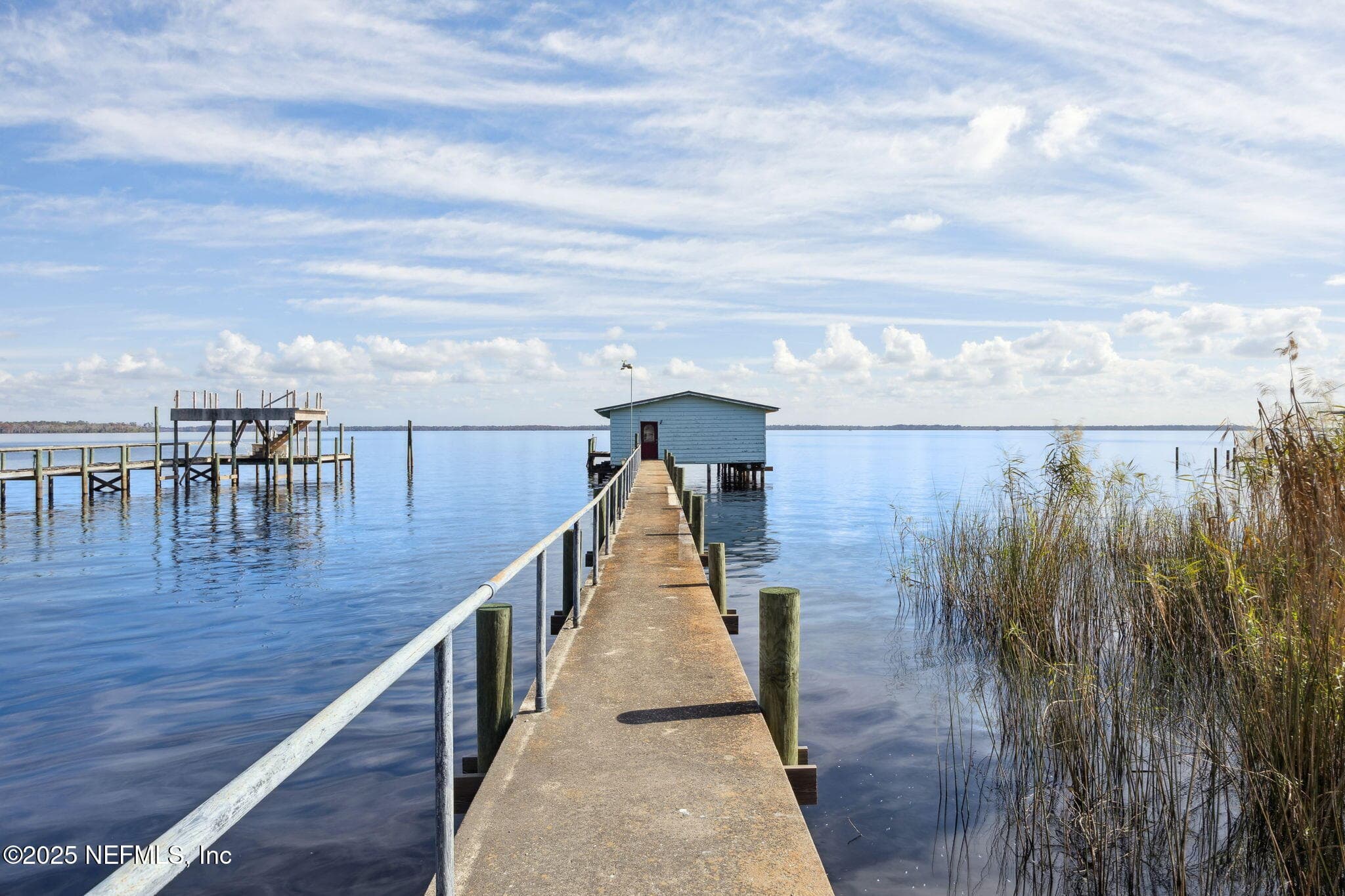 Dock, with handrail to boathouse view 2 — 259 S PROSPECT Street, Crescent City, FL 32112