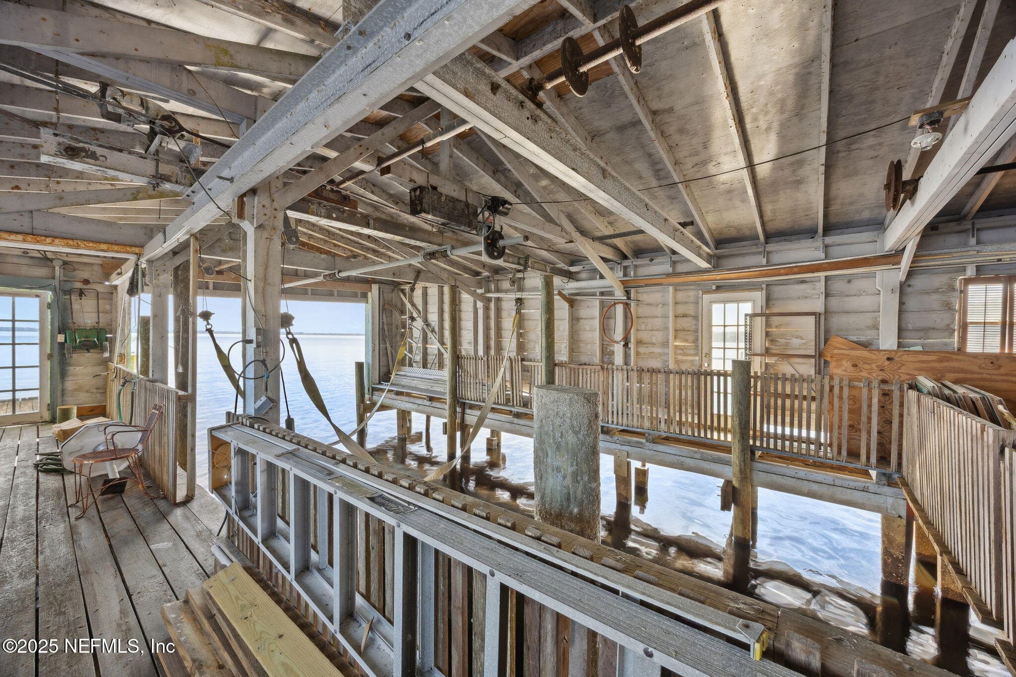 Boathouse interior w/lift view 2 — 259 S PROSPECT Street, Crescent City, FL 32112