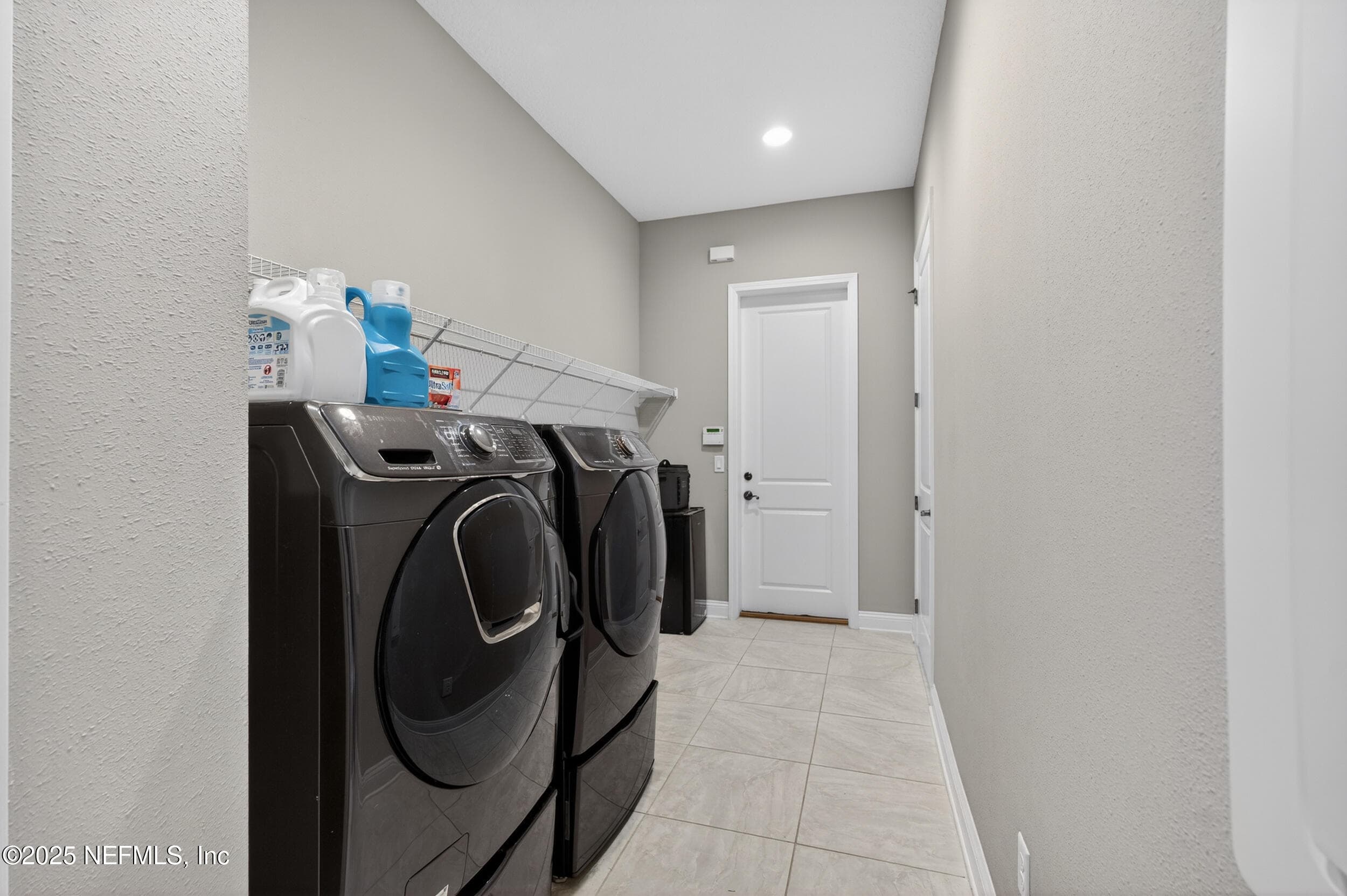 Laundry room with entrance into the garage — 2752 TARTUS Drive, Jacksonville, FL 32246