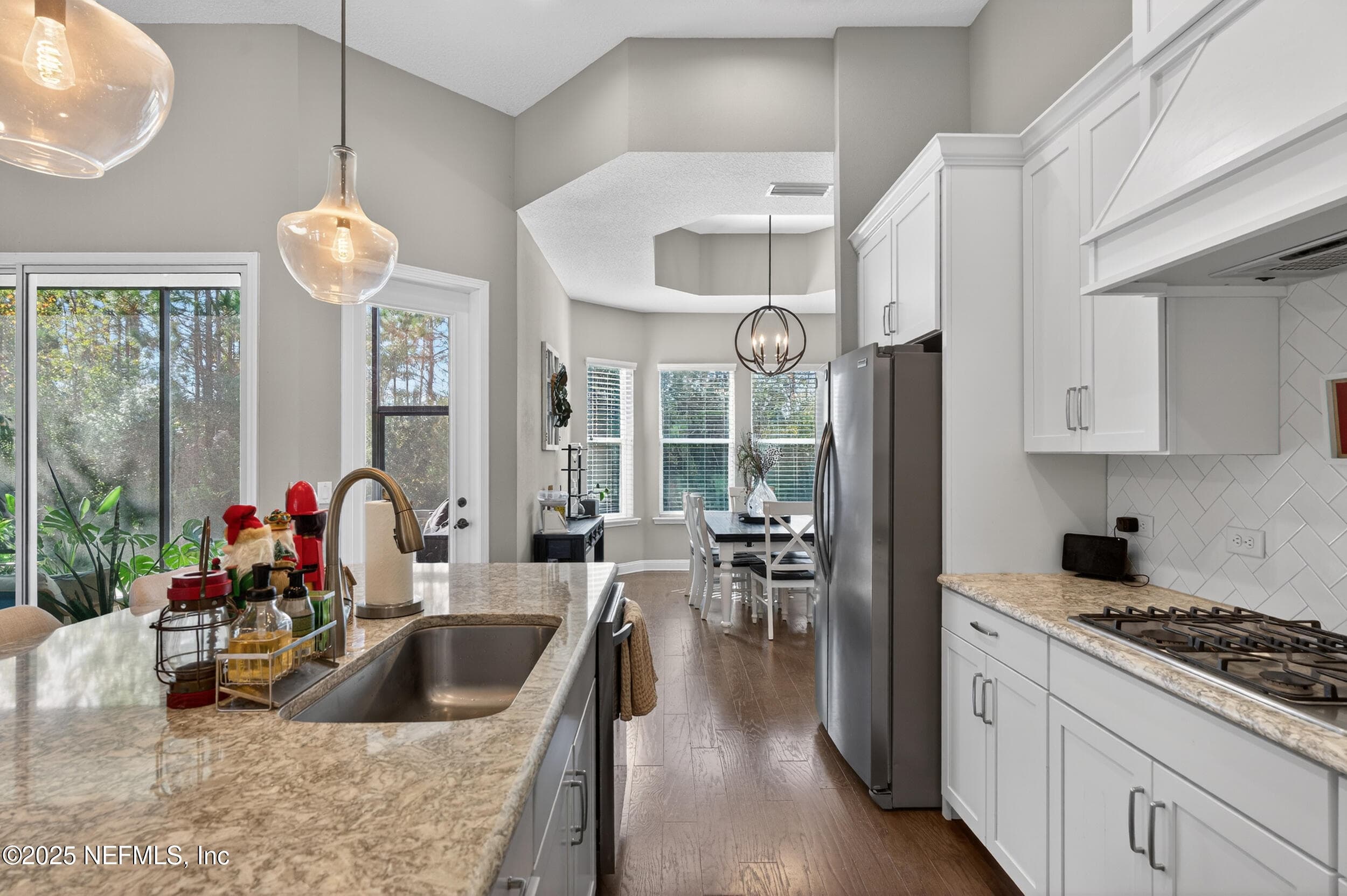 Kitchen with view of the dining space — 2752 TARTUS Drive, Jacksonville, FL 32246