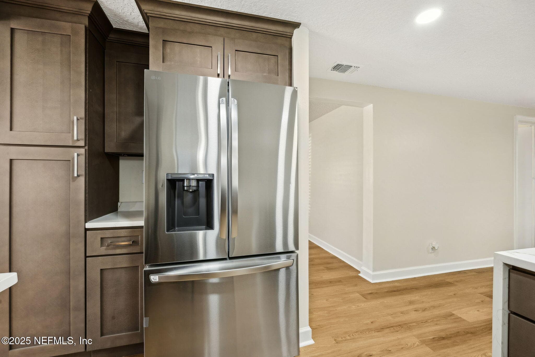 Kitchen Photo #3 All new stainless steel appliances — 7611 MC COWAN Drive, Jacksonville, FL 32244