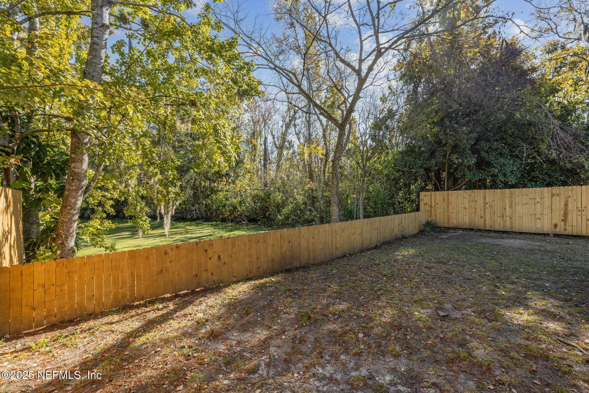 New privacy wood fencing — 7611 MC COWAN Drive, Jacksonville, FL 32244