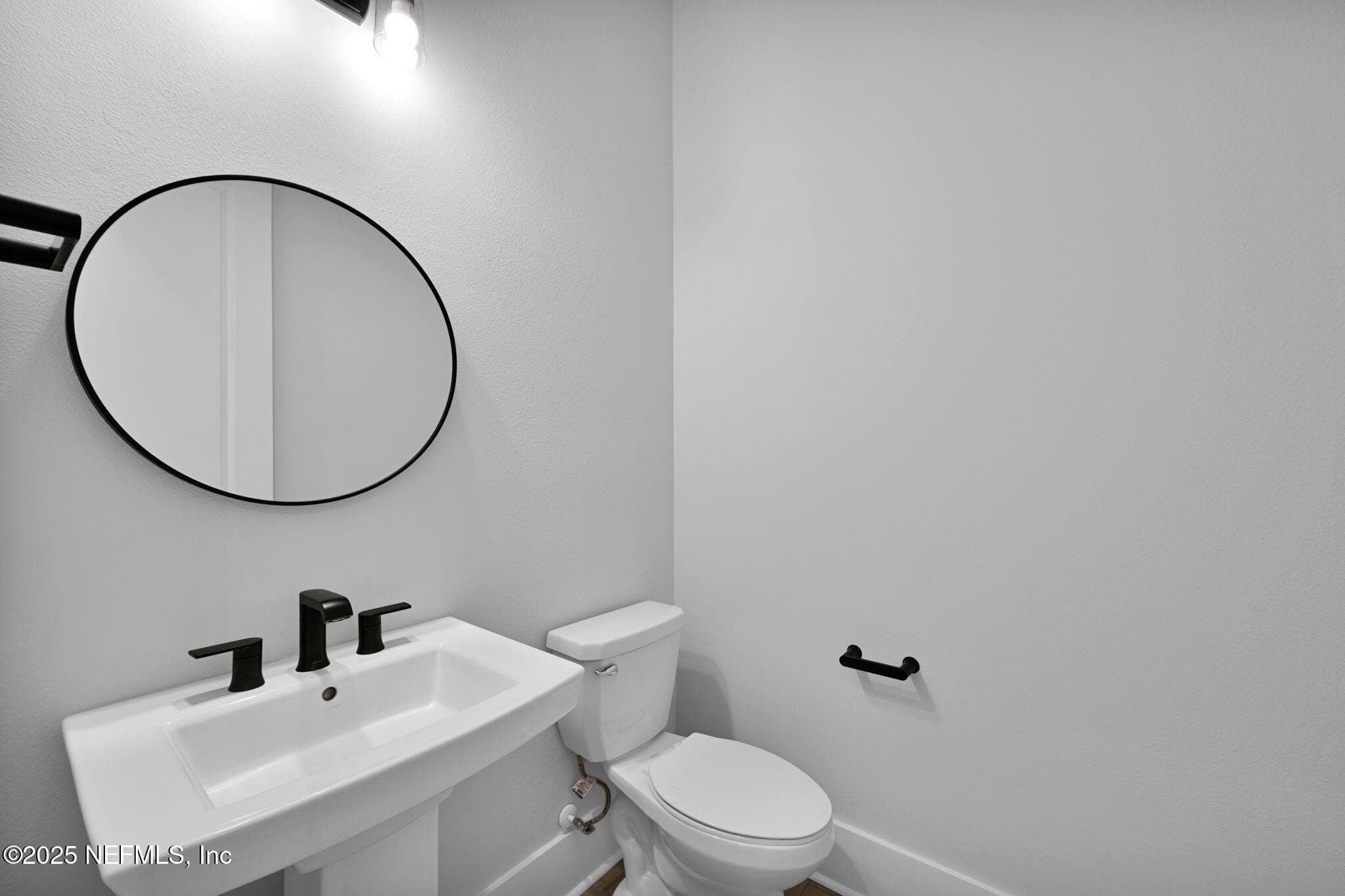 Half bath at Enry — 40 SPARROW CREEK Drive, St. Augustine, FL 32092