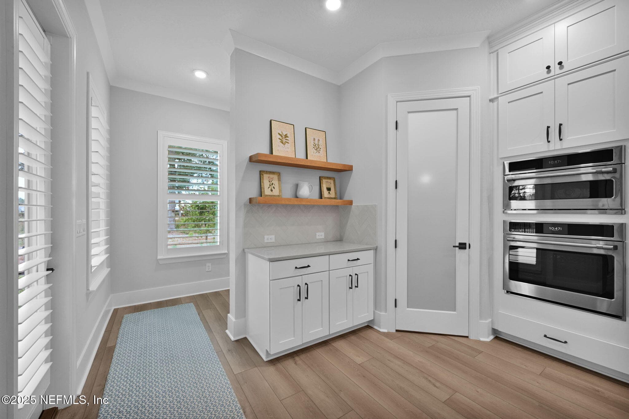 Kitchen/ hallway to Pool bath — 40 SPARROW CREEK Drive, St. Augustine, FL 32092