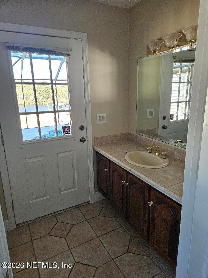 Pool Bath connects to dn stairs BR #5 and Pool — 435 LAKE ASBURY Drive, Green Cove Springs, FL 32043