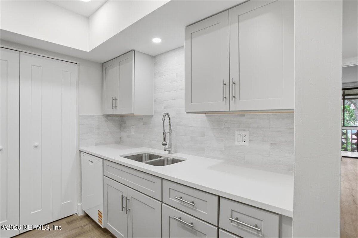 New cabinets, countertops, and faucet. — 1810 SEVILLA Boulevard 310, Atlantic Beach, FL 32233