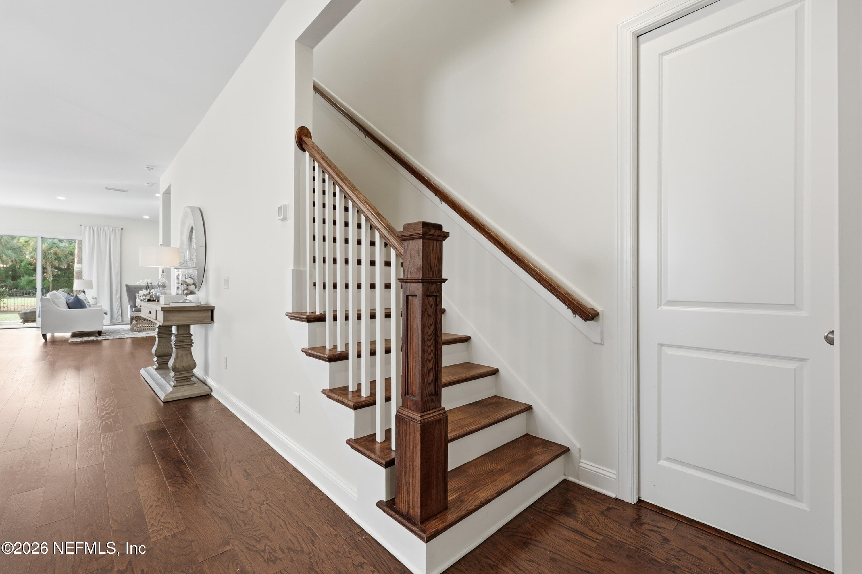 Entry hall with staircase leads to Great Room on second-floor with 4th bedroom and wet bar. — 568 TIMBER BRIDGE Lane, Atlantic Beach, FL 32233