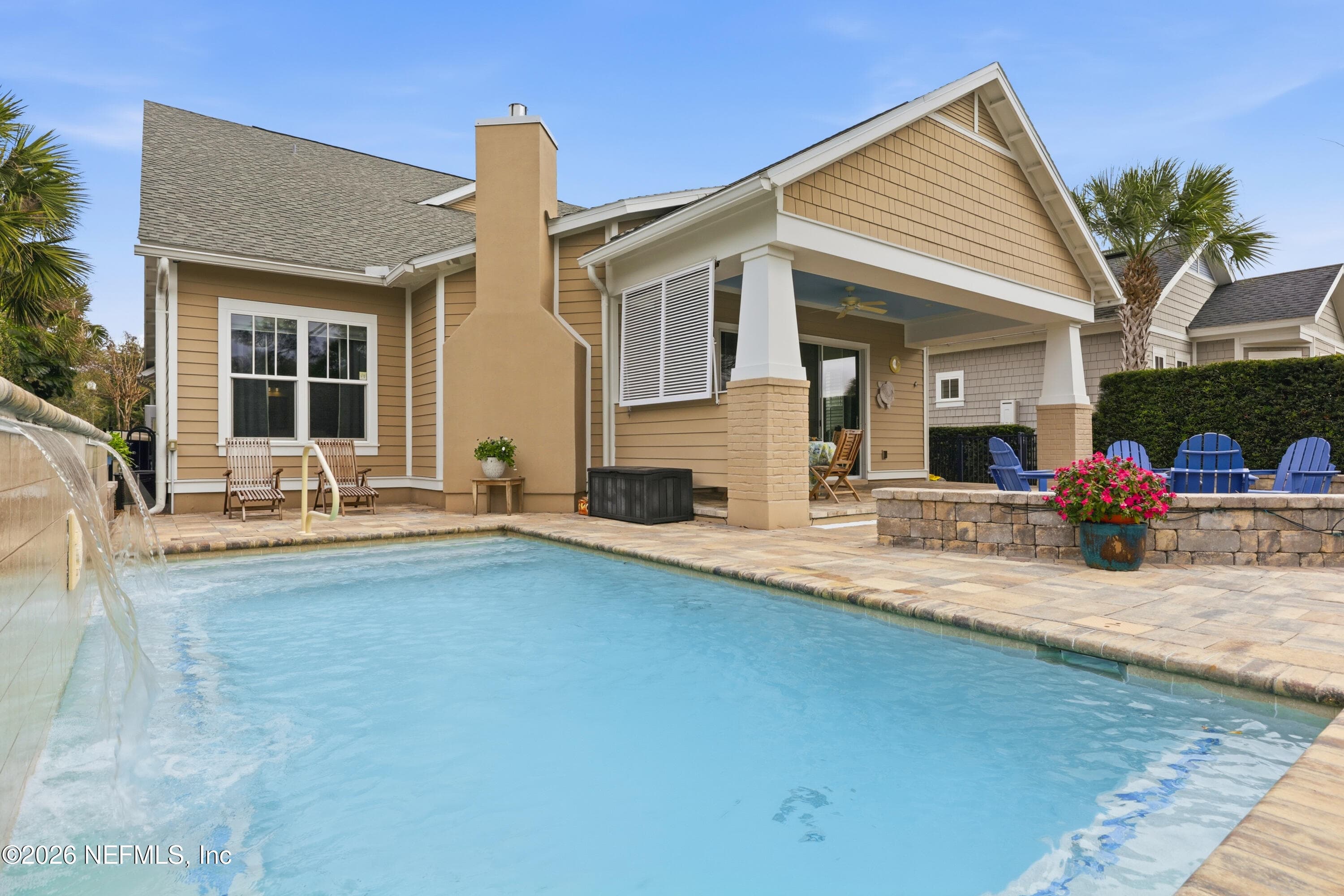 Lounge by the in-ground pool and soak in the peace of your private backyard. — 568 TIMBER BRIDGE Lane, Atlantic Beach, FL 32233