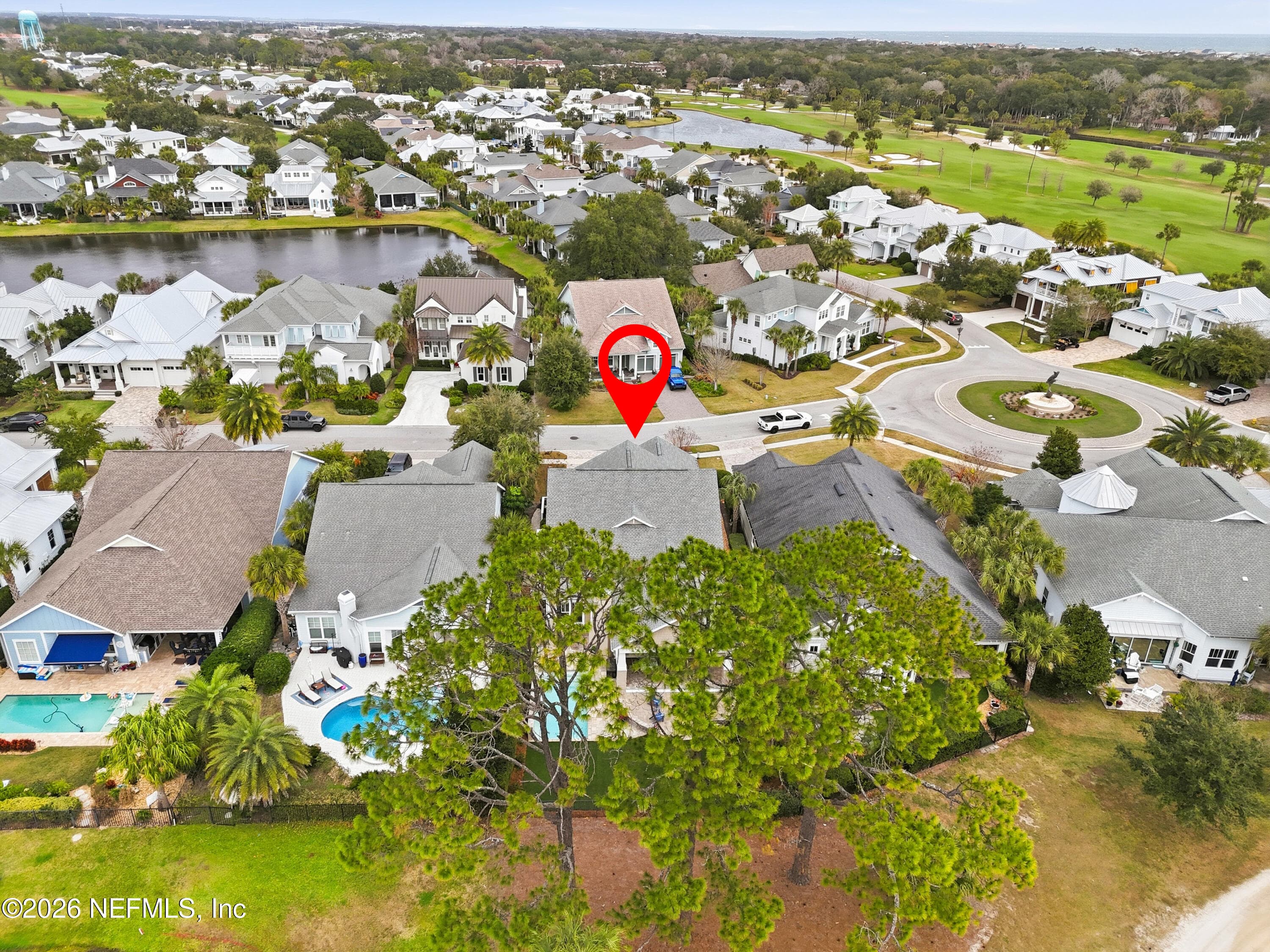 Wider aerial showing the home location within the golf-course community setting. — 568 TIMBER BRIDGE Lane, Atlantic Beach, FL 32233