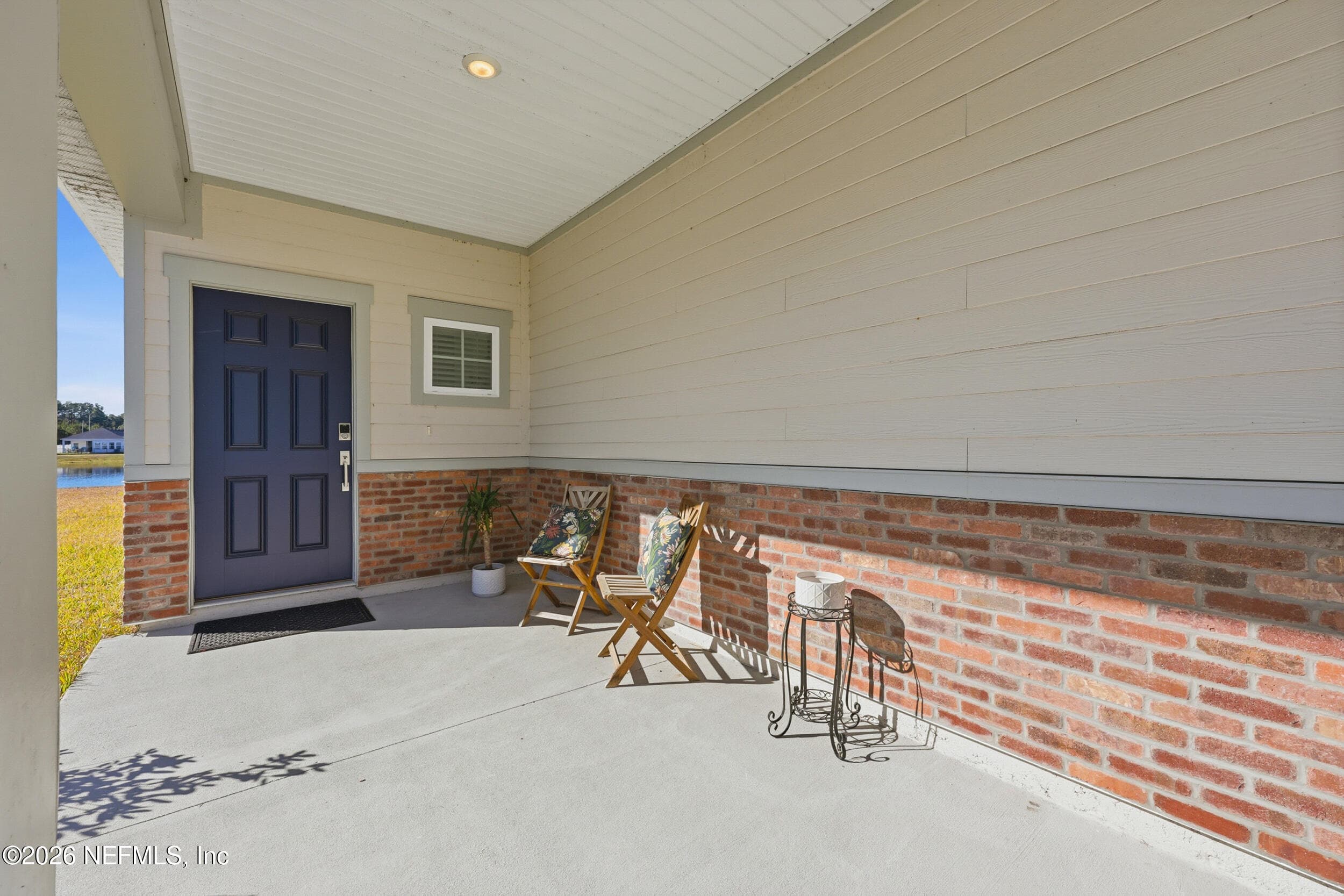 Welcoming covered from entryway — 95252 TERRIS Way, Fernandina Beach, FL 32034