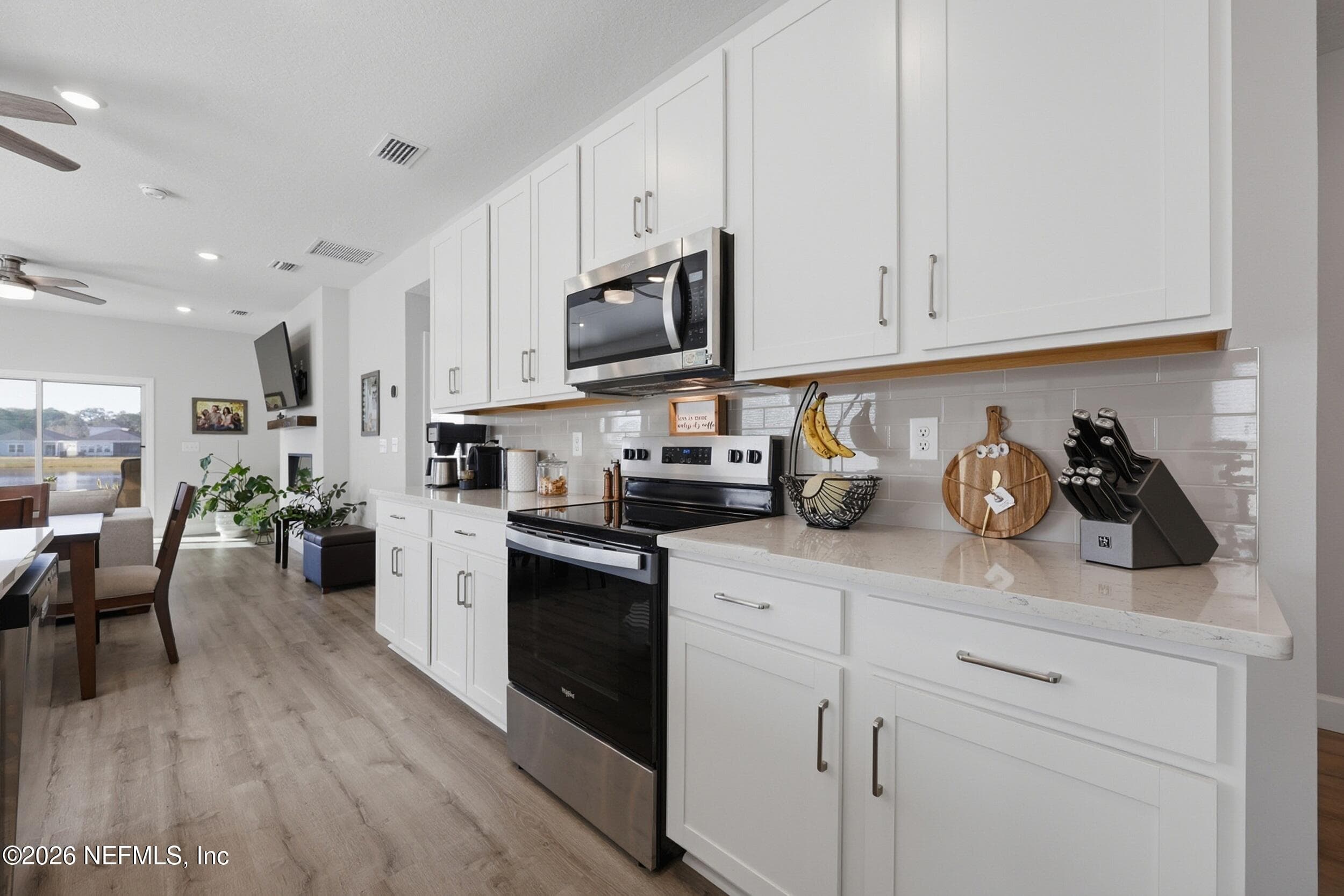 seamless design with plenty of cabinets for storage — 95252 TERRIS Way, Fernandina Beach, FL 32034
