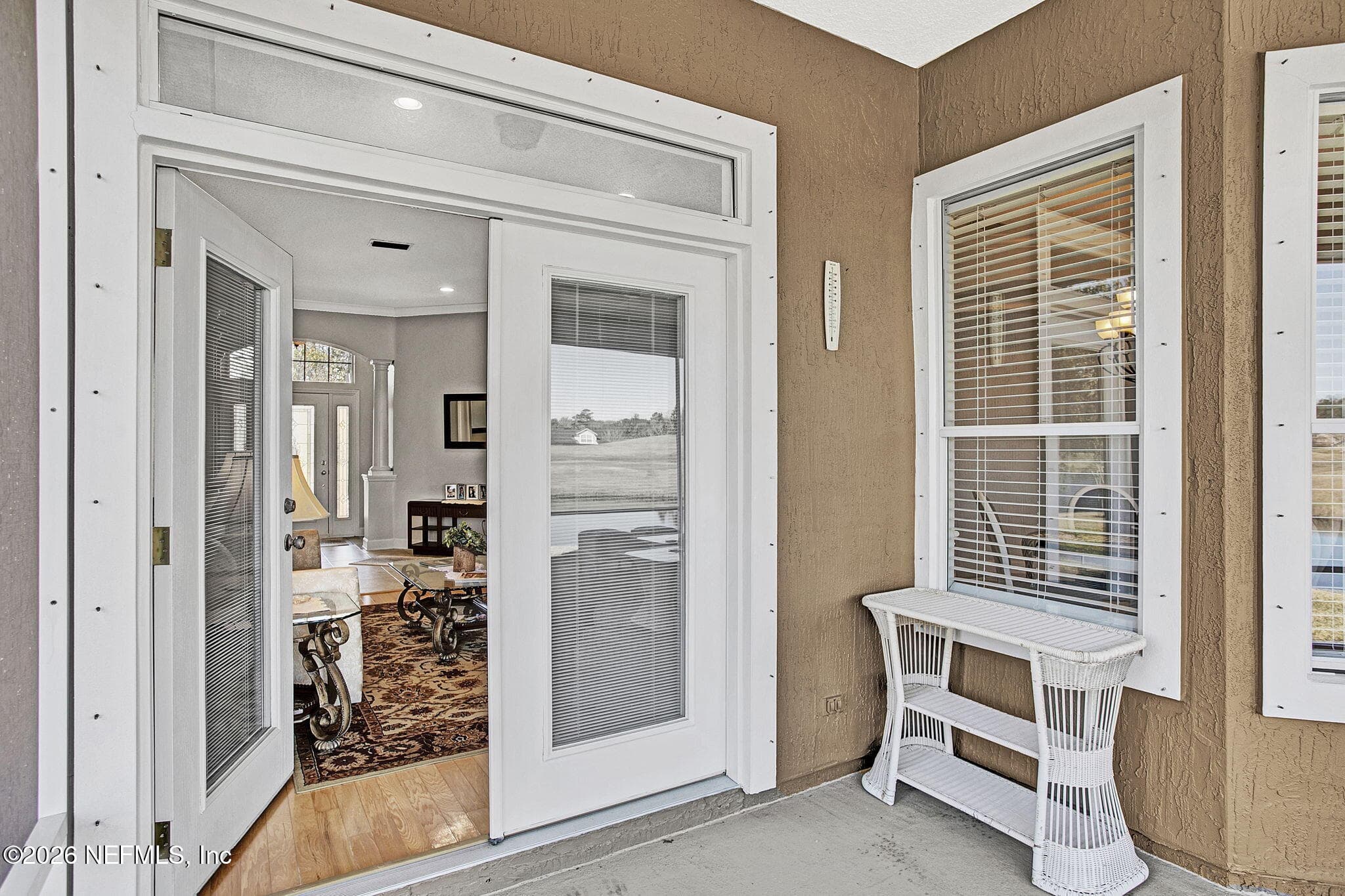 One of Two Sets of French Doors Leading to the Screened Lanai — 3576 BARTON CREEK Circle, Green Cove Springs, FL 32043