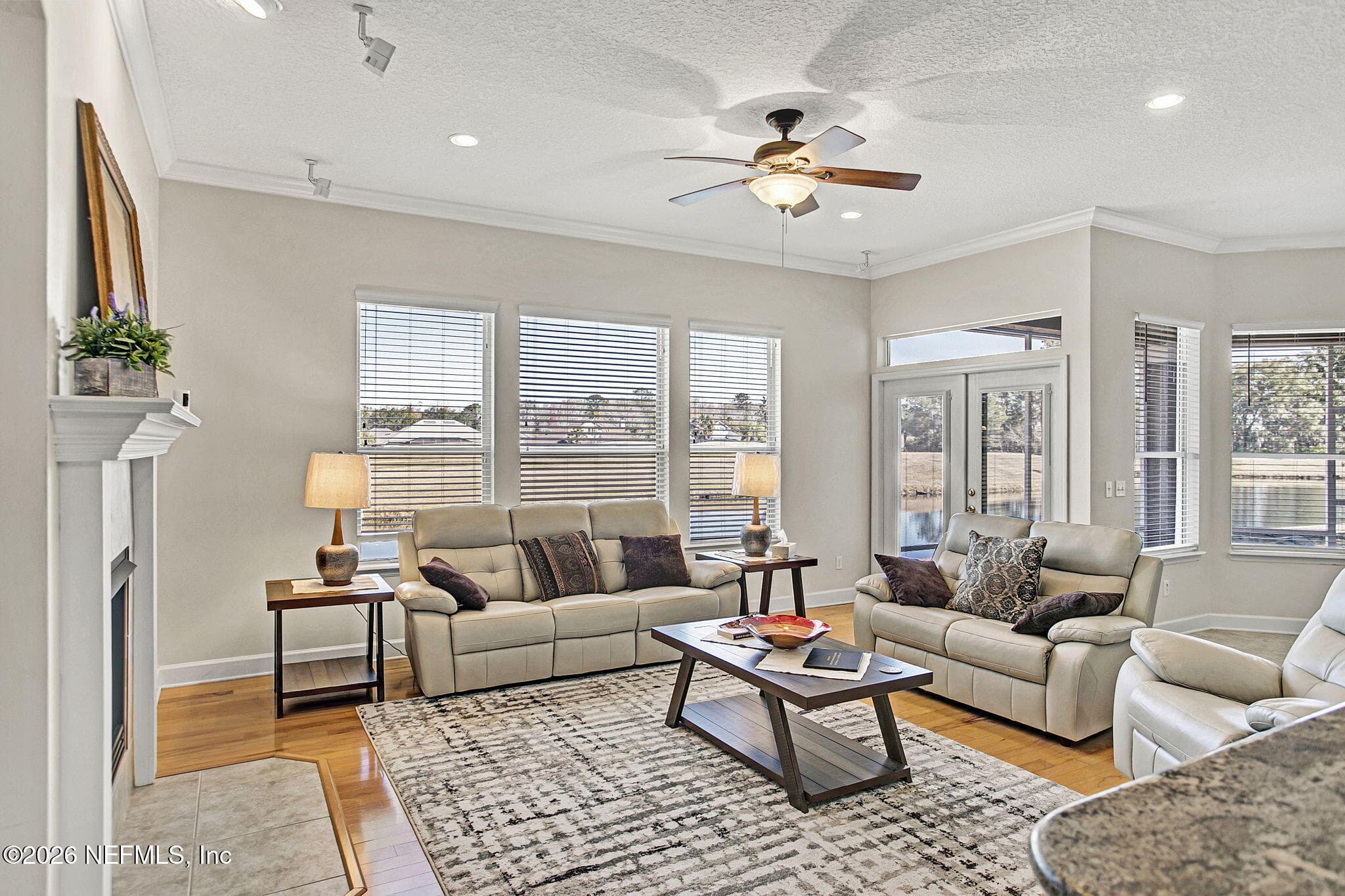 Family Room With French Doors Leading To The Lanai — 3576 BARTON CREEK Circle, Green Cove Springs, FL 32043